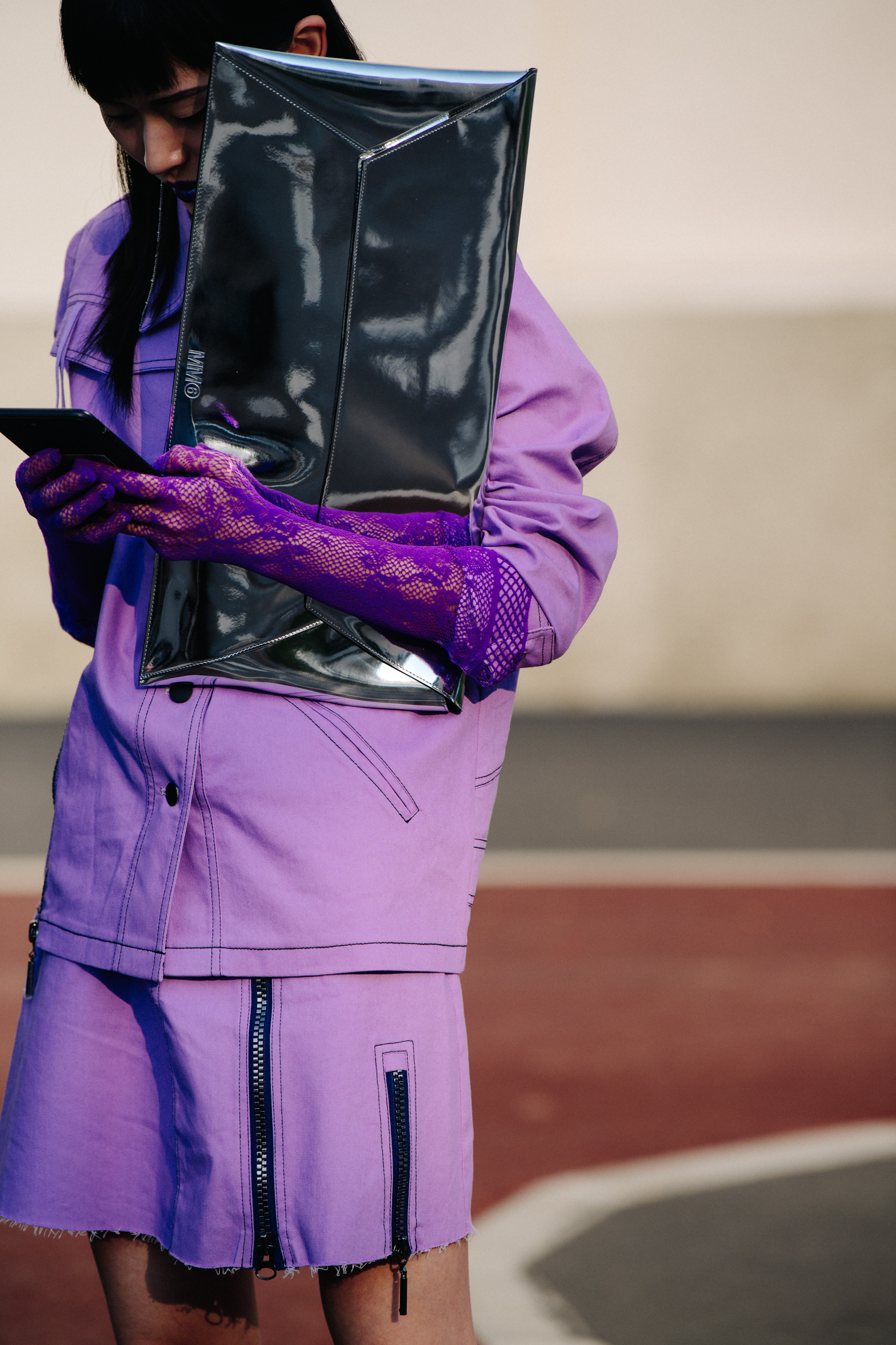 Asian woman wearing Maison Margiela outfit