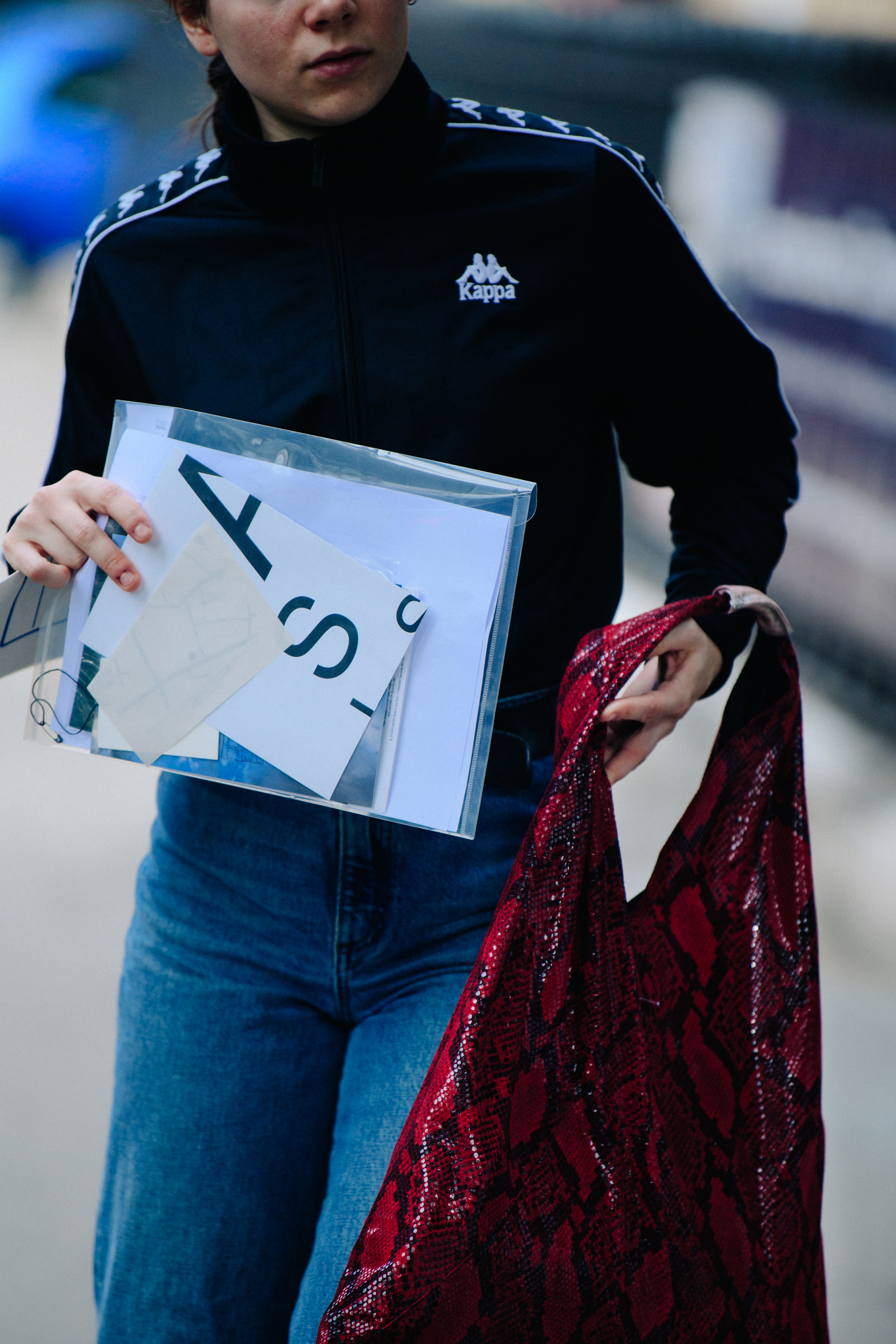 Woman wearing Kappa jacket