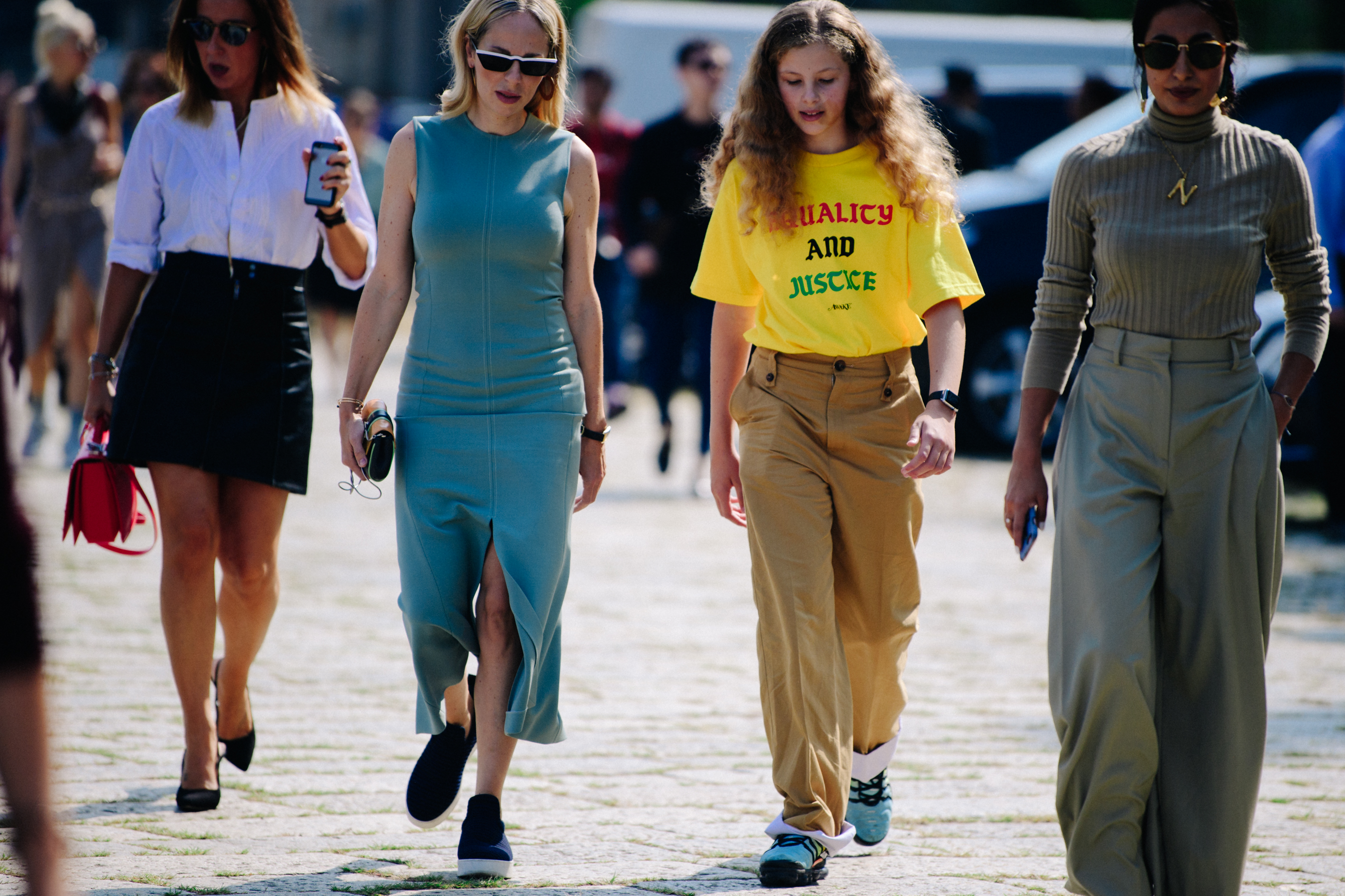 Mother and daughter attending fashion show
