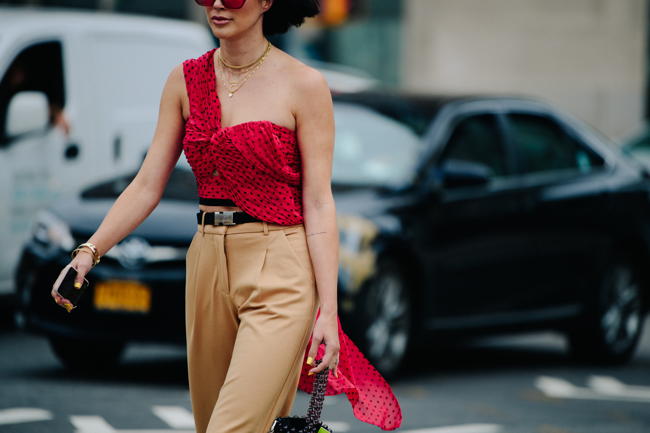 Woman wearing red polka dot top