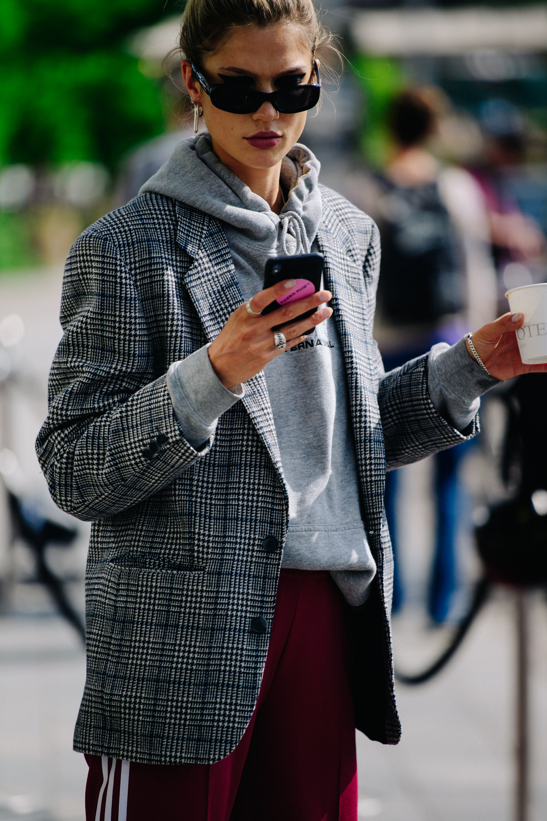 Woman wearing check coat
