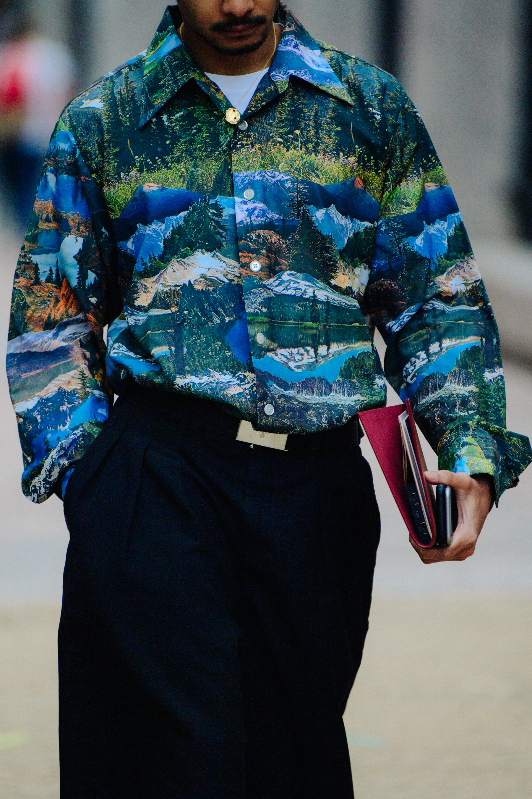 Man wearing blue pattern shirt
