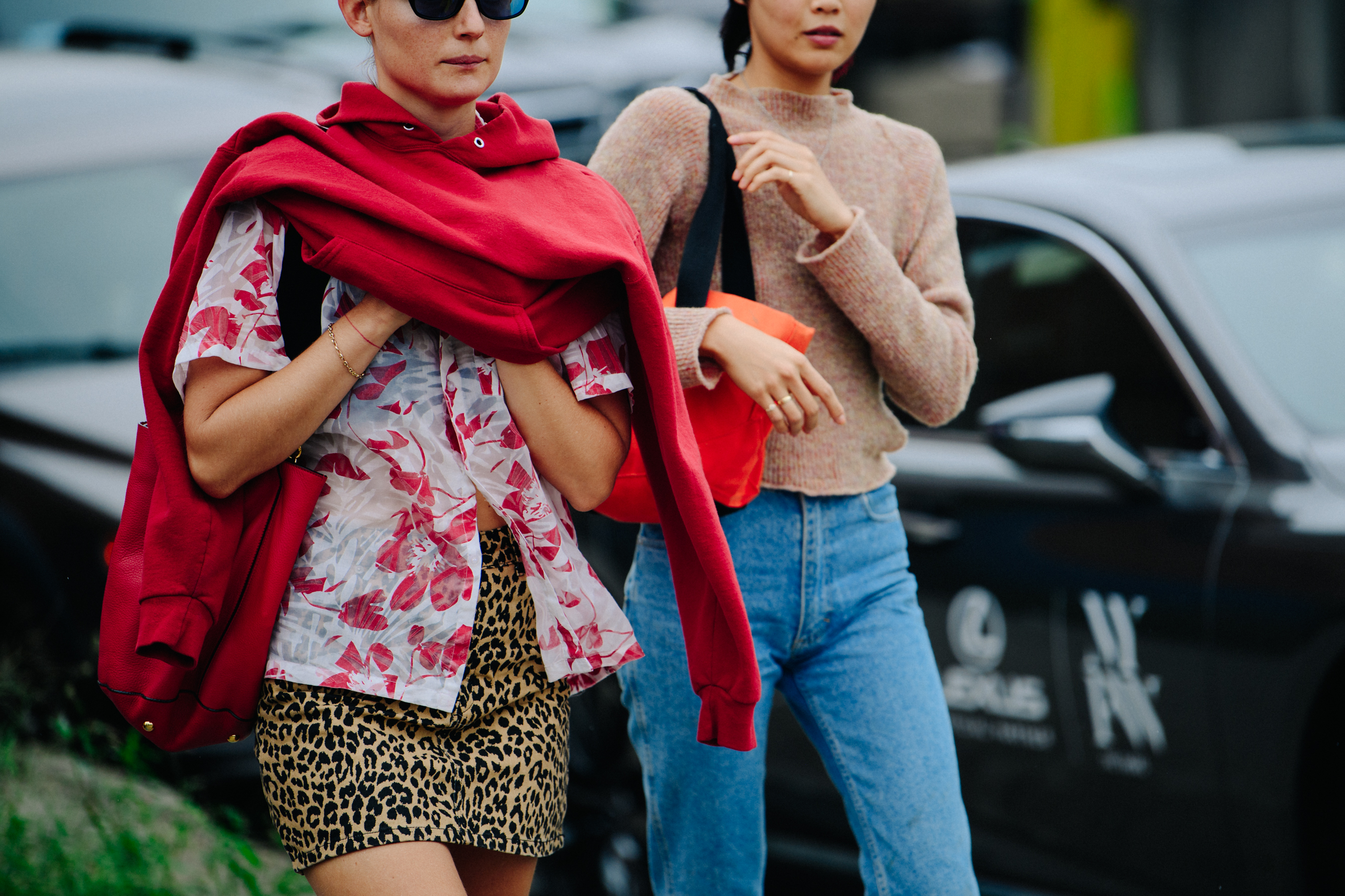 Two models wearing red