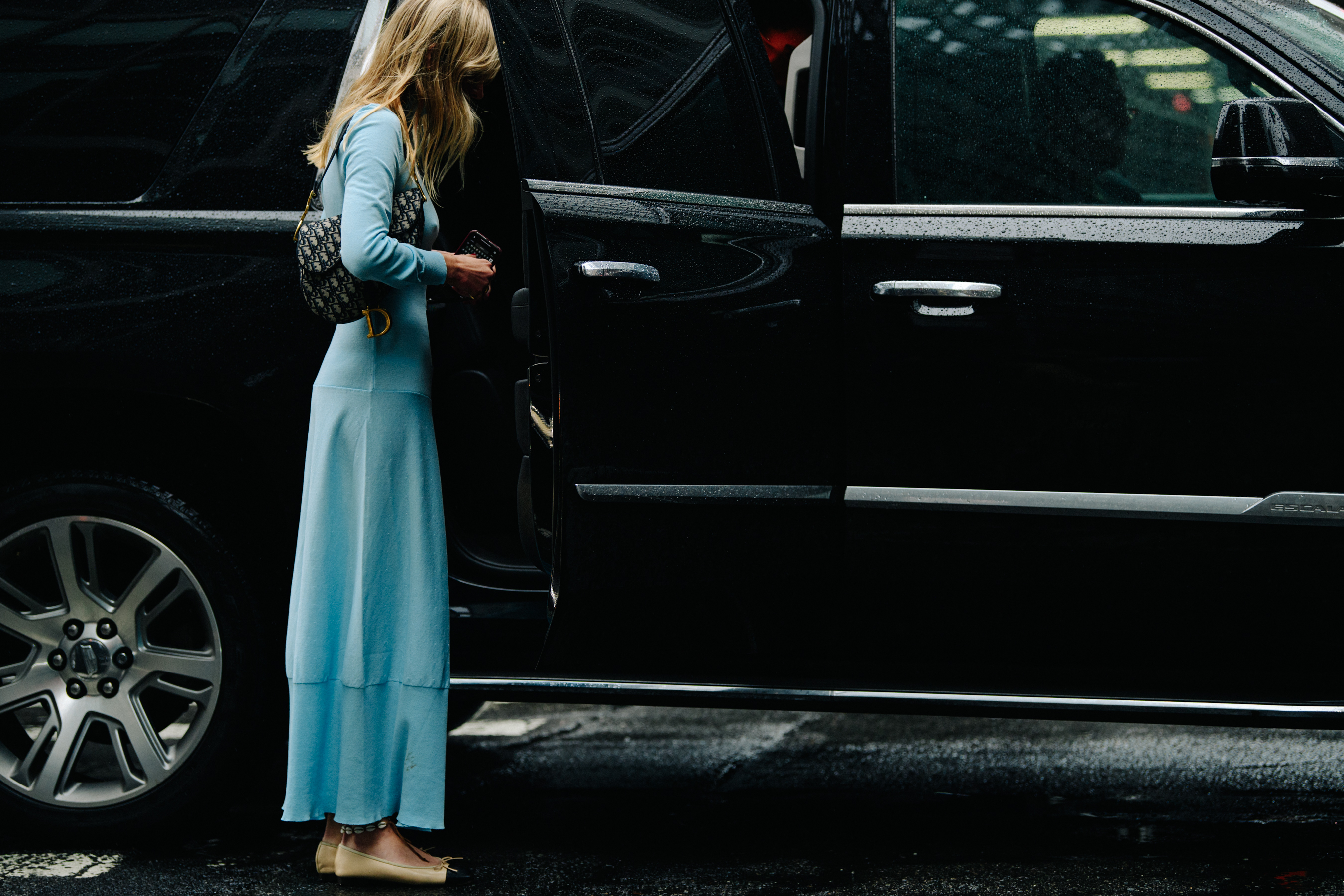 French woman wearing blue dress
