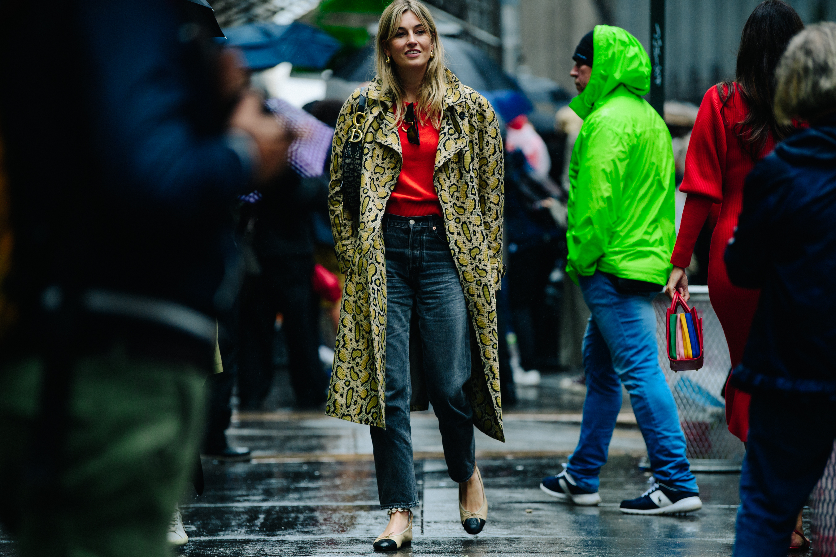 French woman wearing snakeskin coat