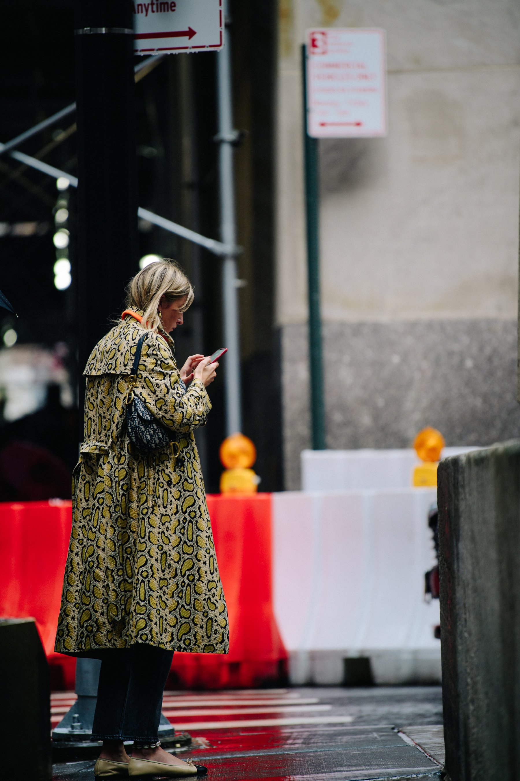 French woman wearing snakeskin coat