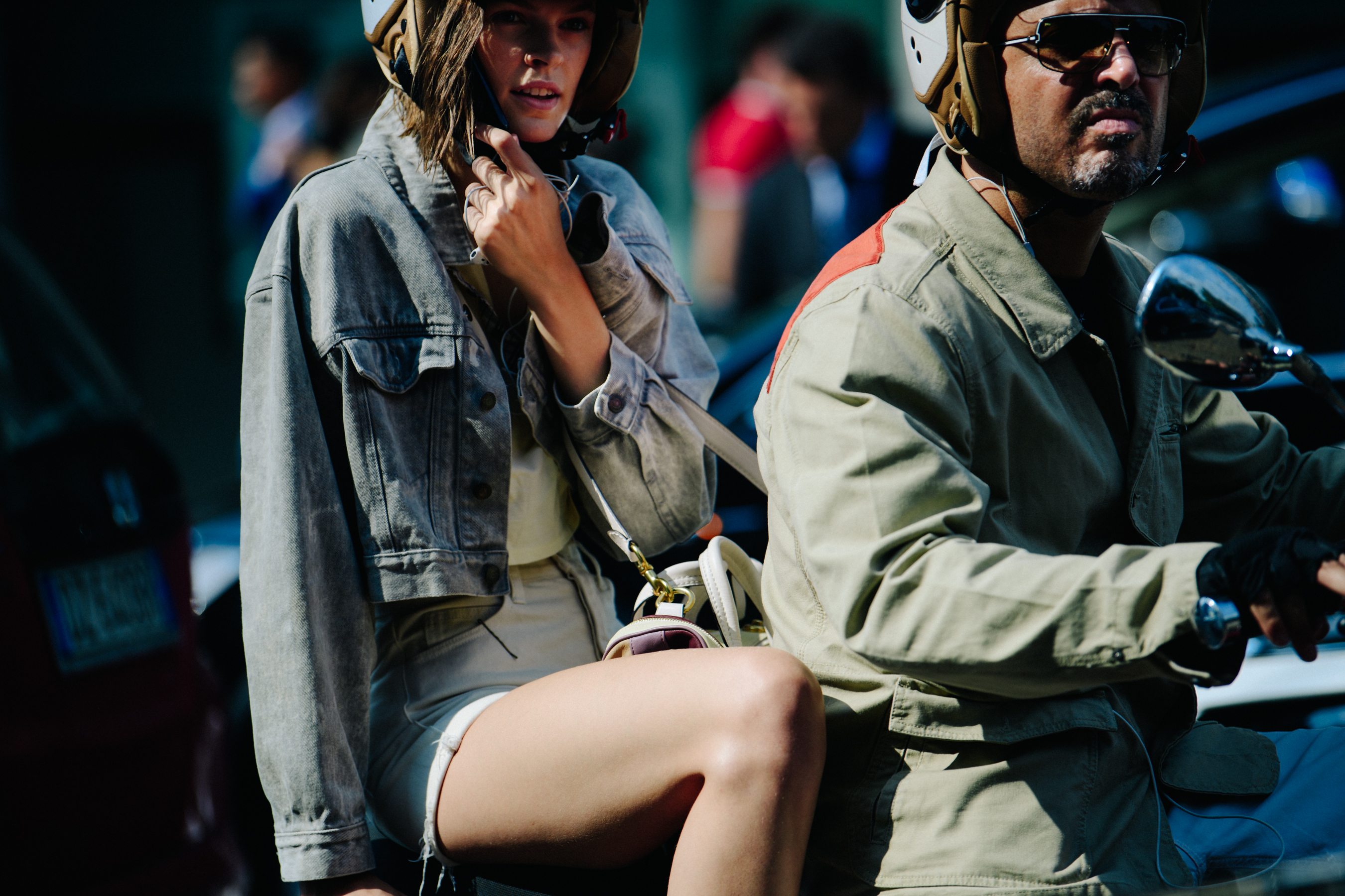 American model riding scooter