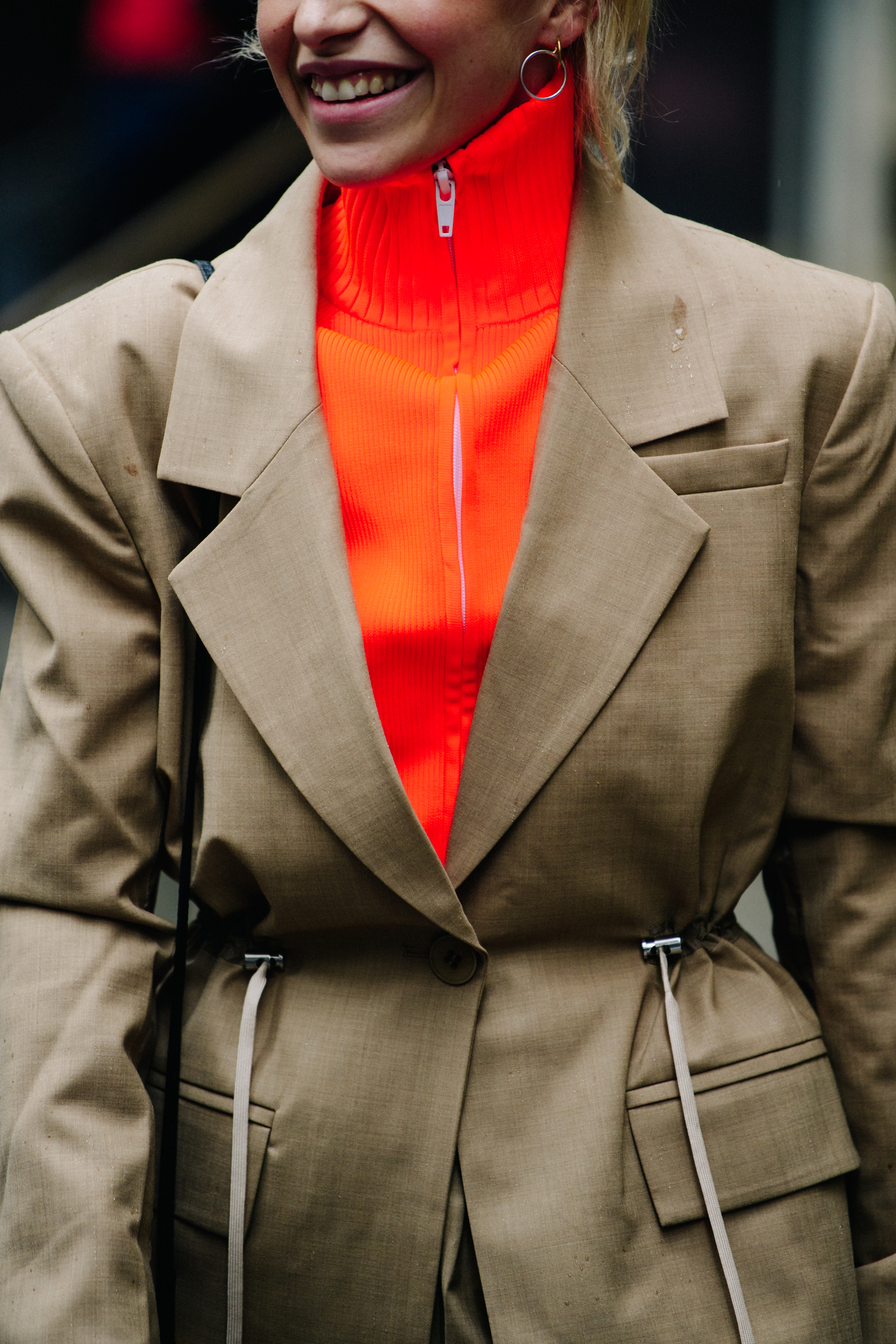 German blogger wearing tan suit