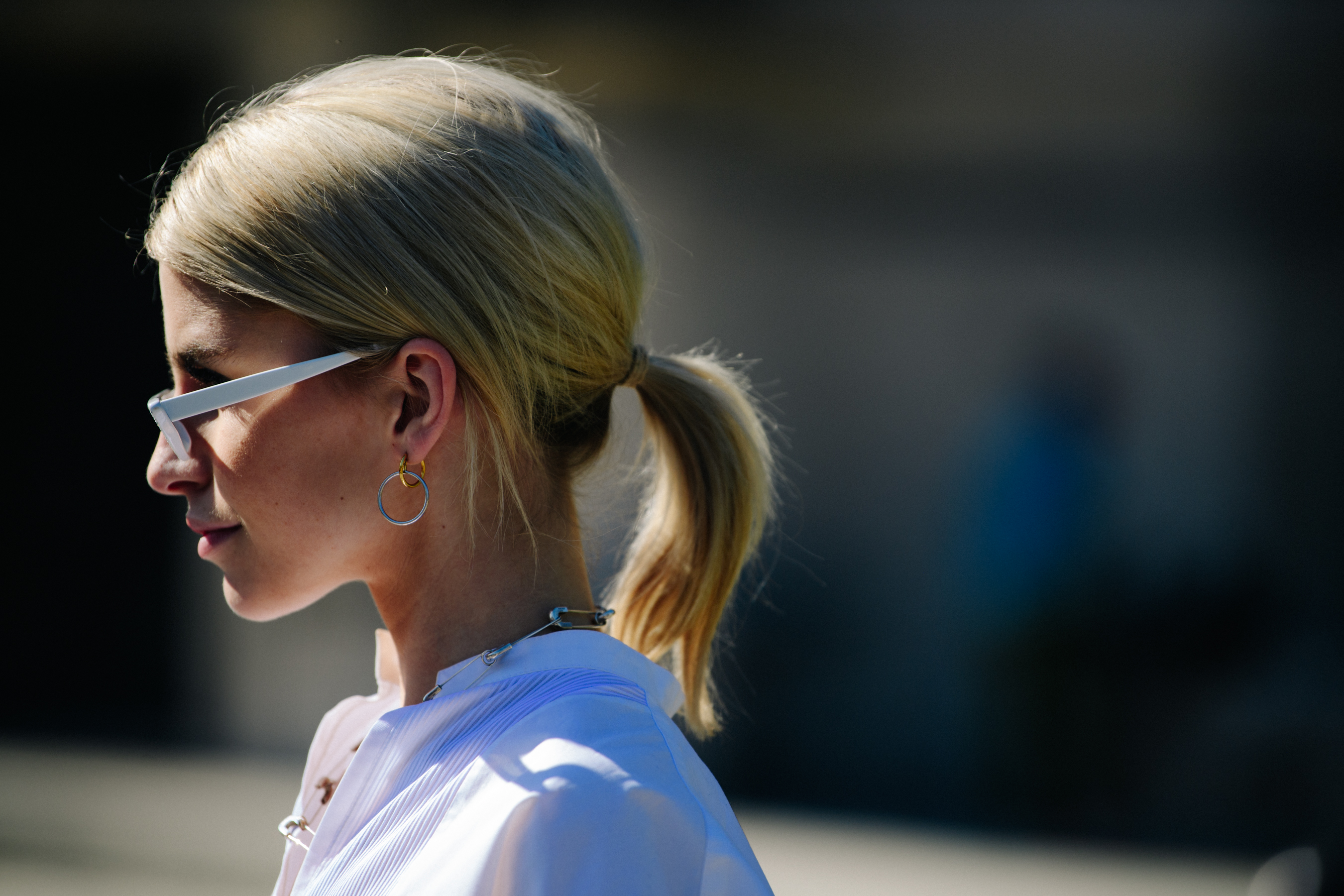 German blogger wearing white sunglasses