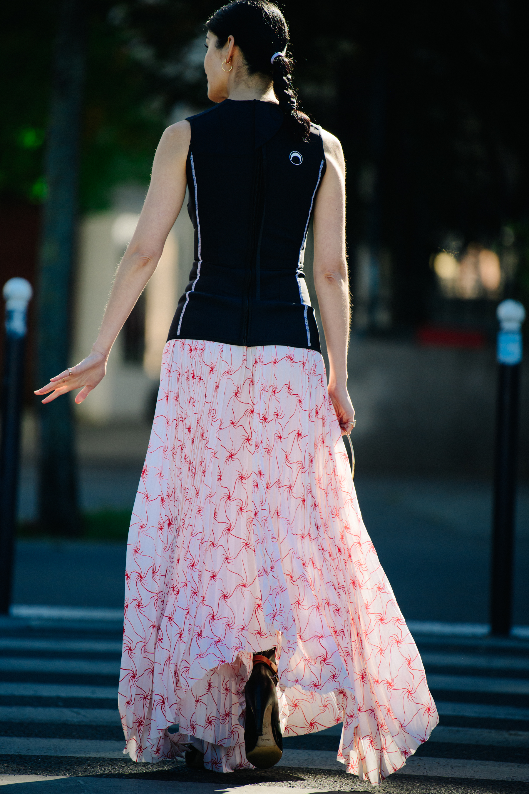 Woman wearing long white skirt