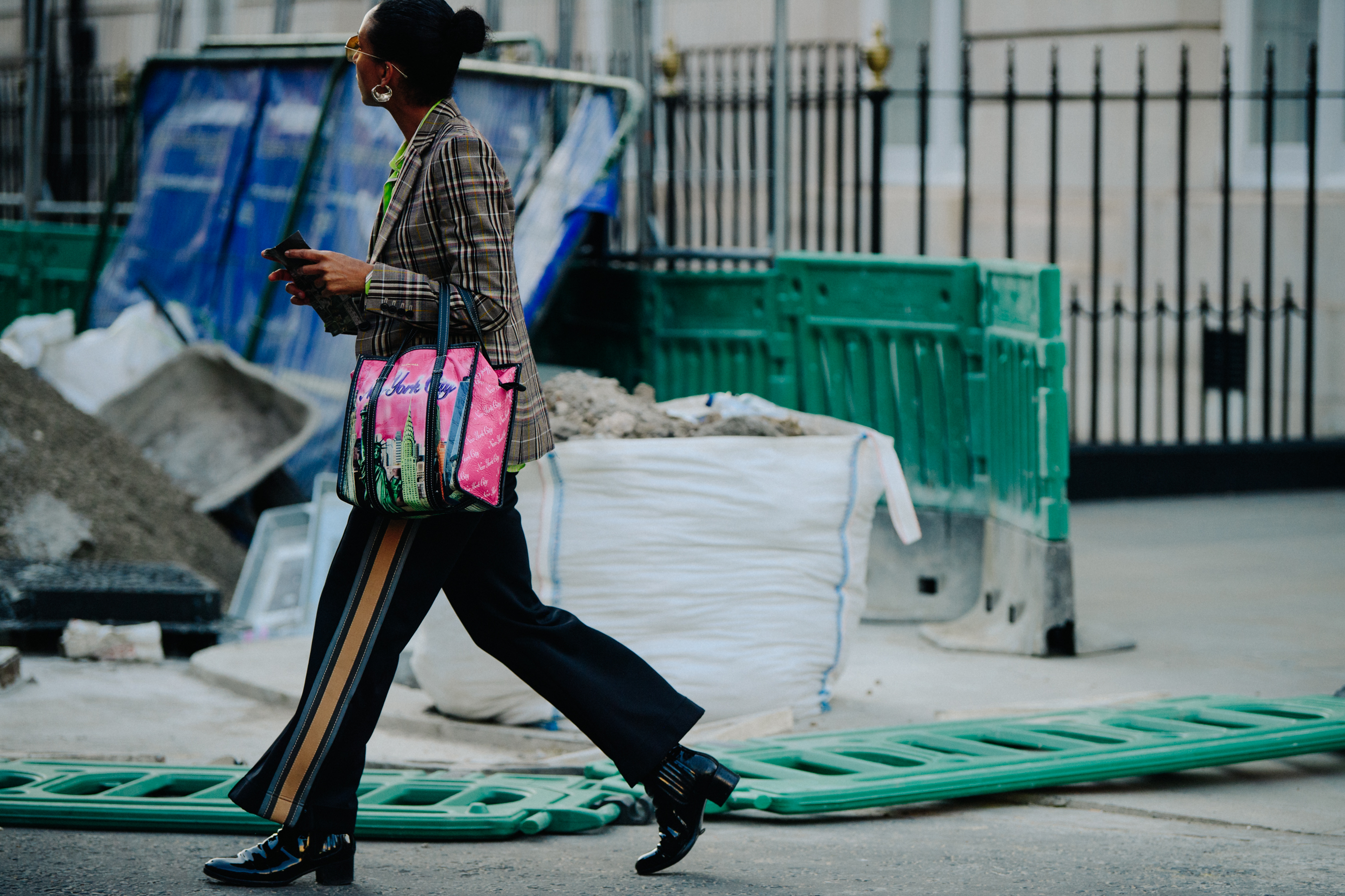 Woman wearing check coat