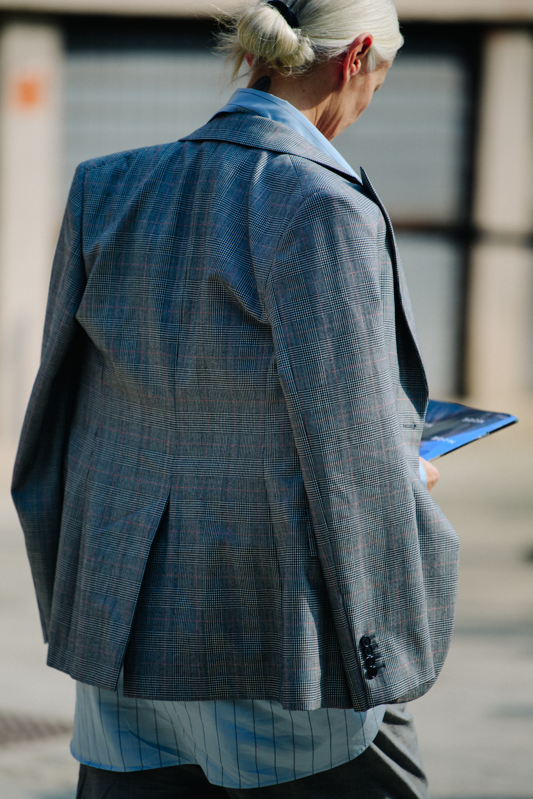Woman wearing grey blazer
