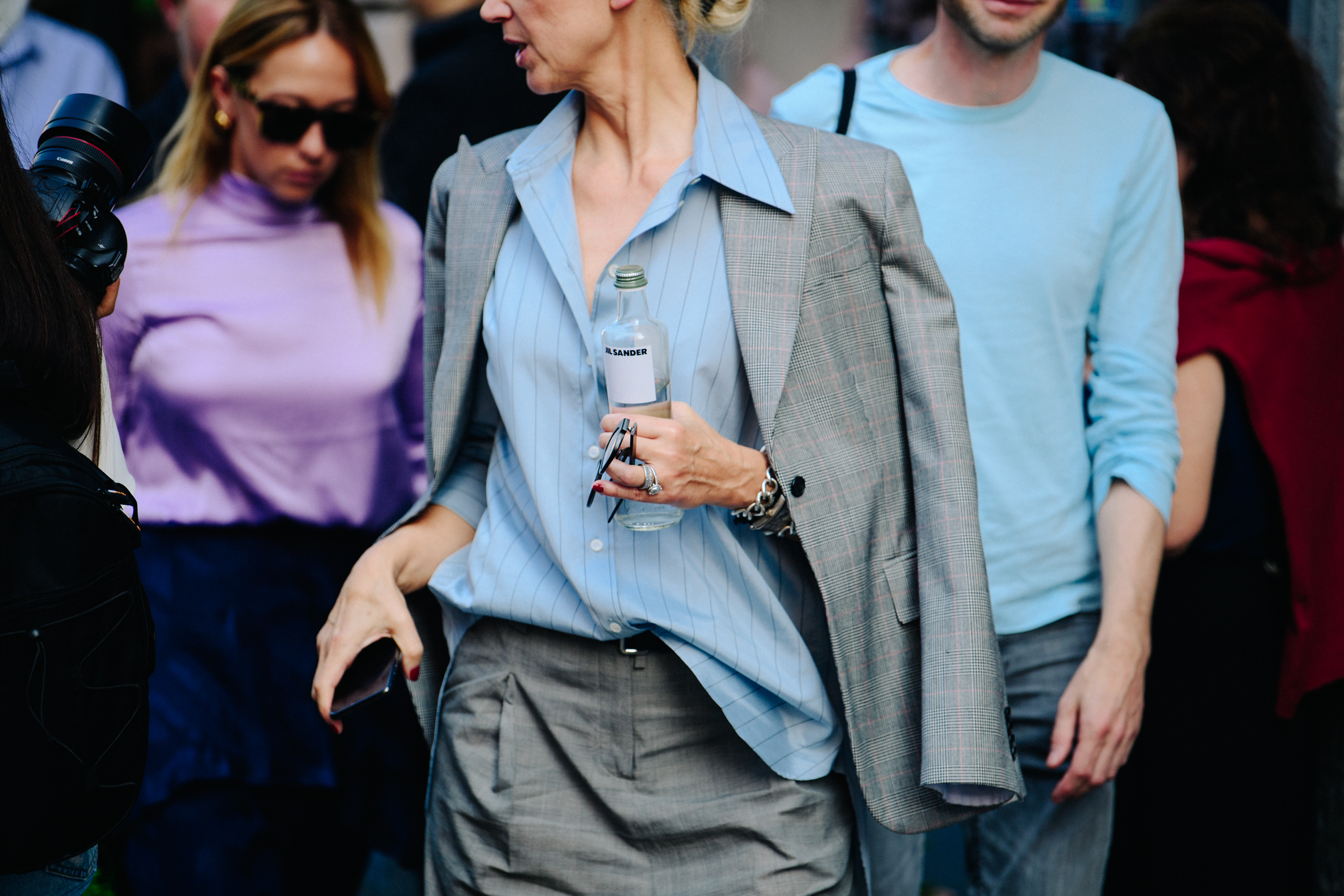 Woman wearing blue striped shirt