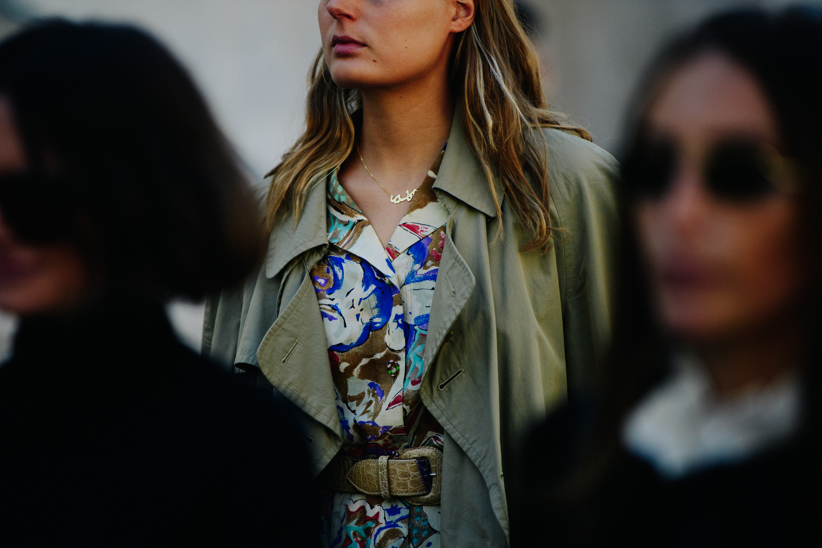 Woman wearing gold necklace