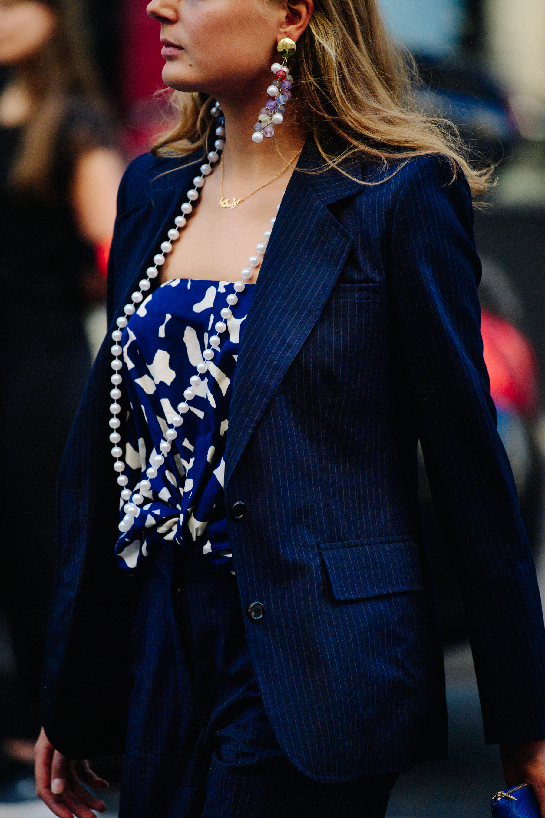 Woman wearing blue striped jacket