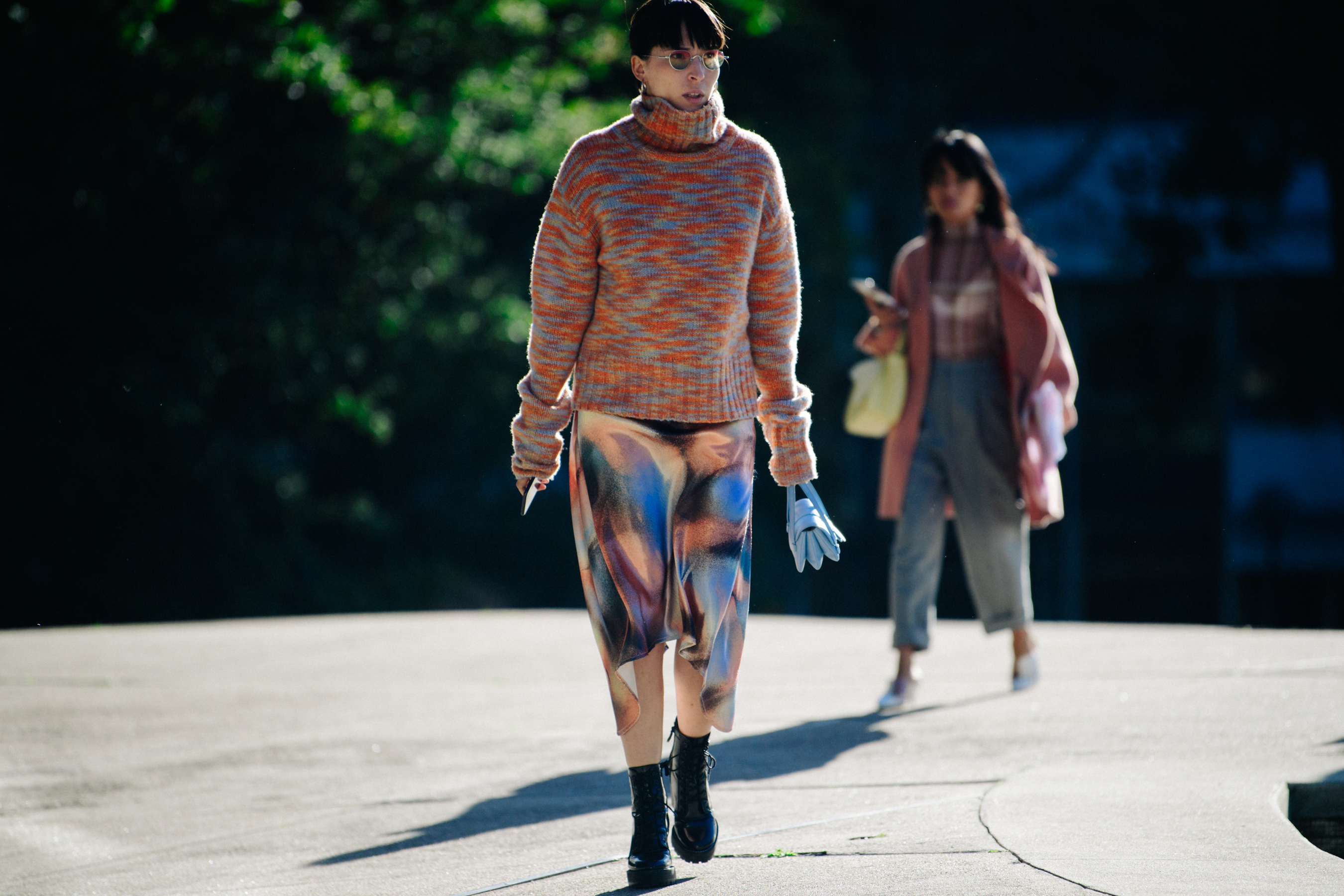 Woman wearing thick colouful jumper
