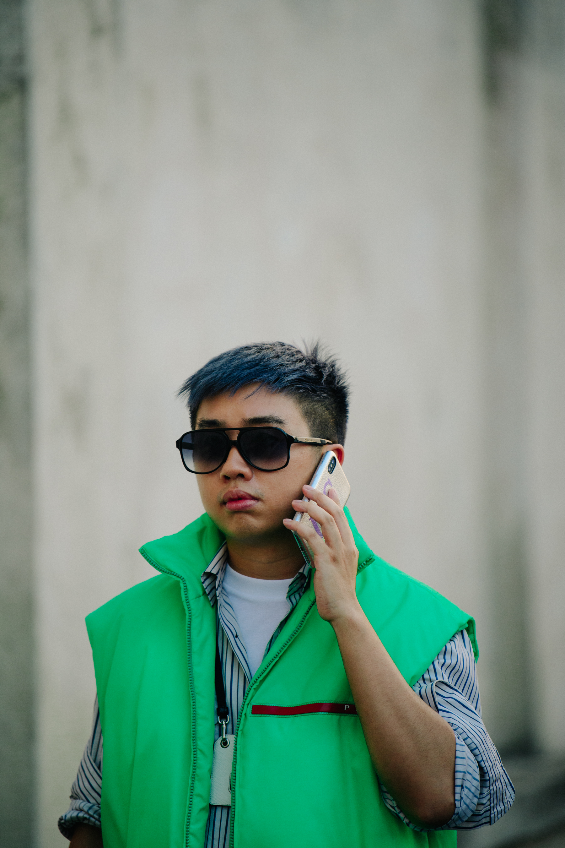 Man wearing green Prada vest