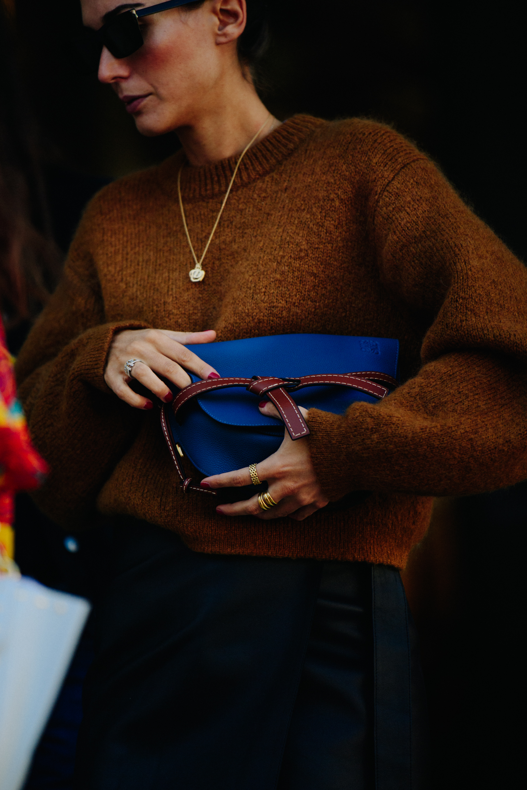 Italian woman carrying Loewe bag