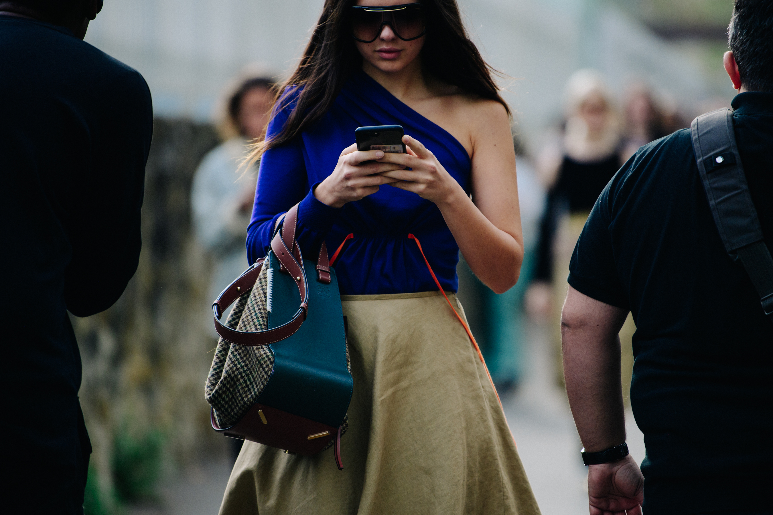 Italian woman wearing tan skirt