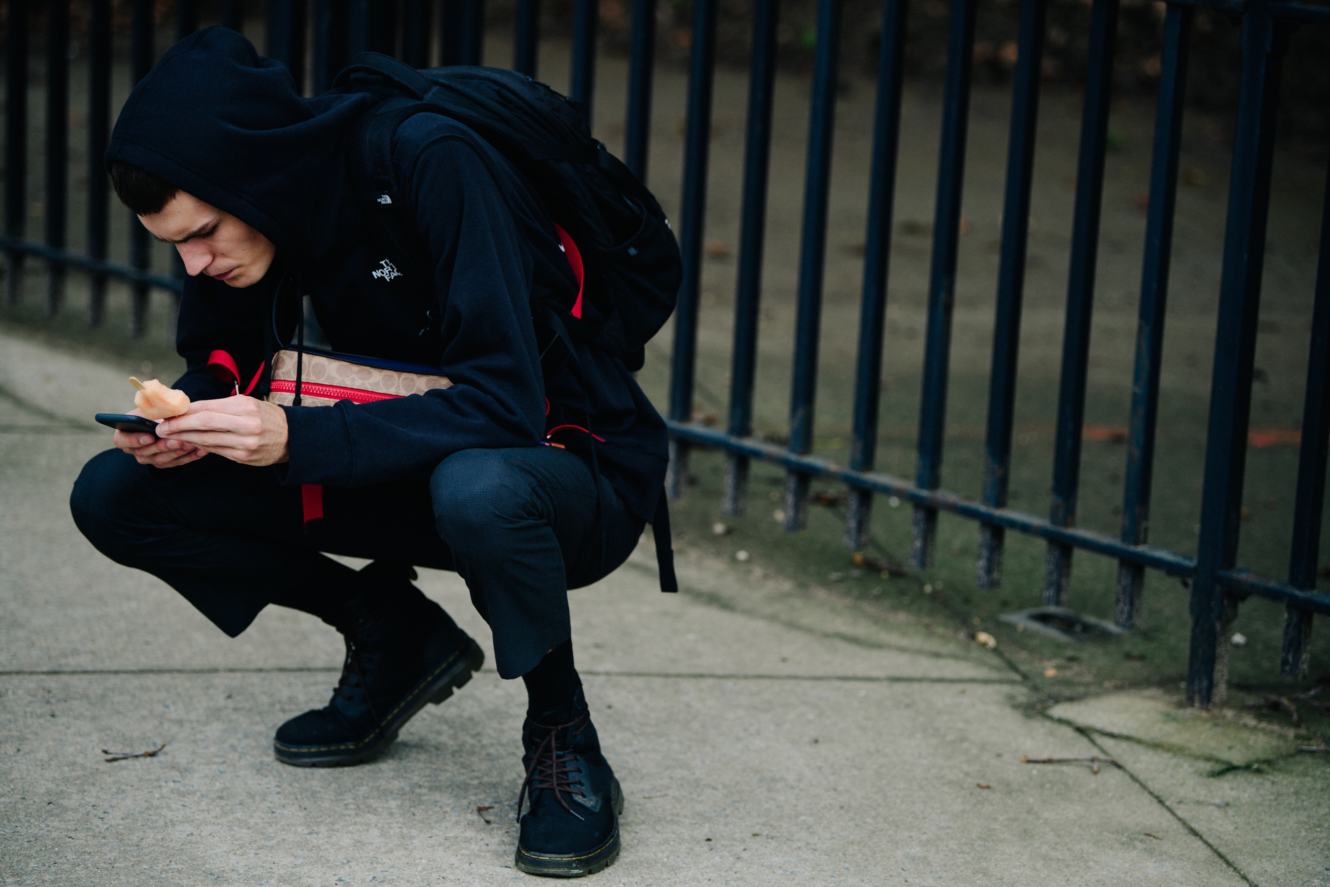 Model wearing black hoodie