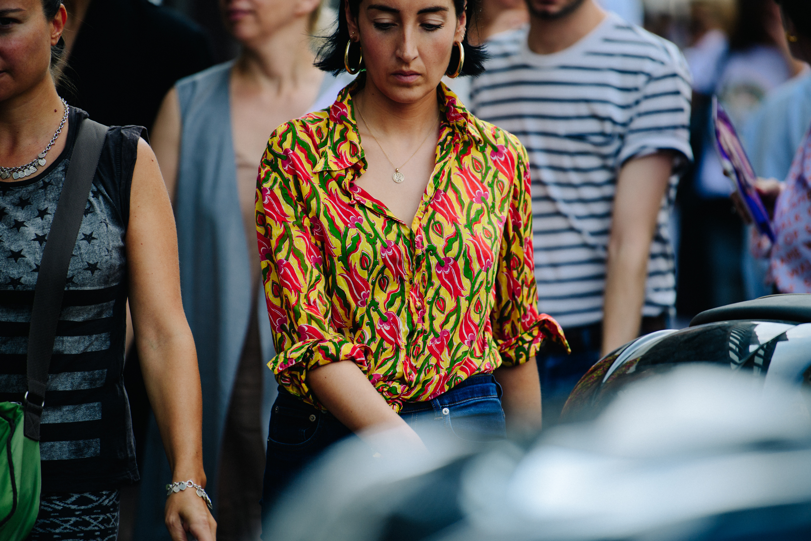 Woman wearing colourful shirt