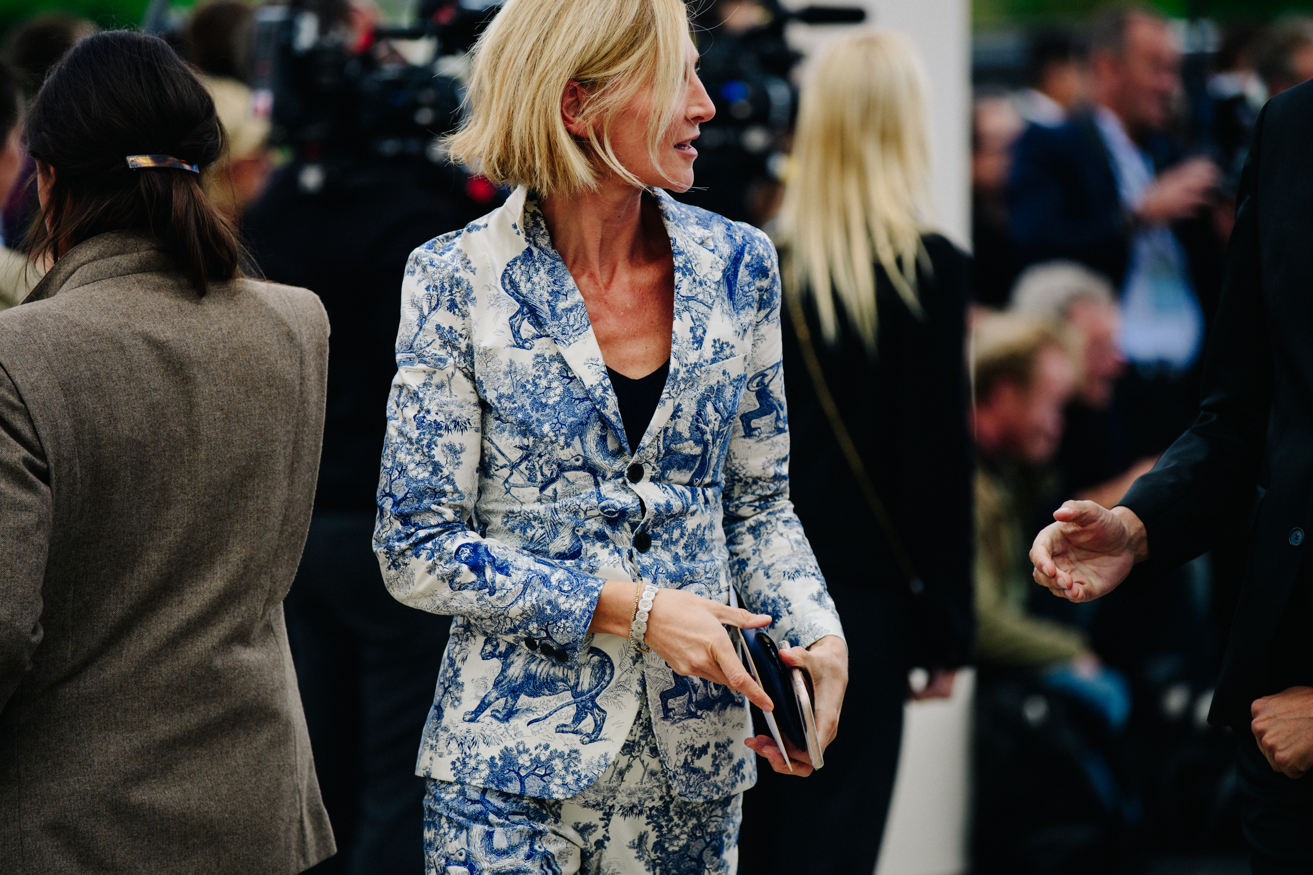 Woman wearing blue floral jacket