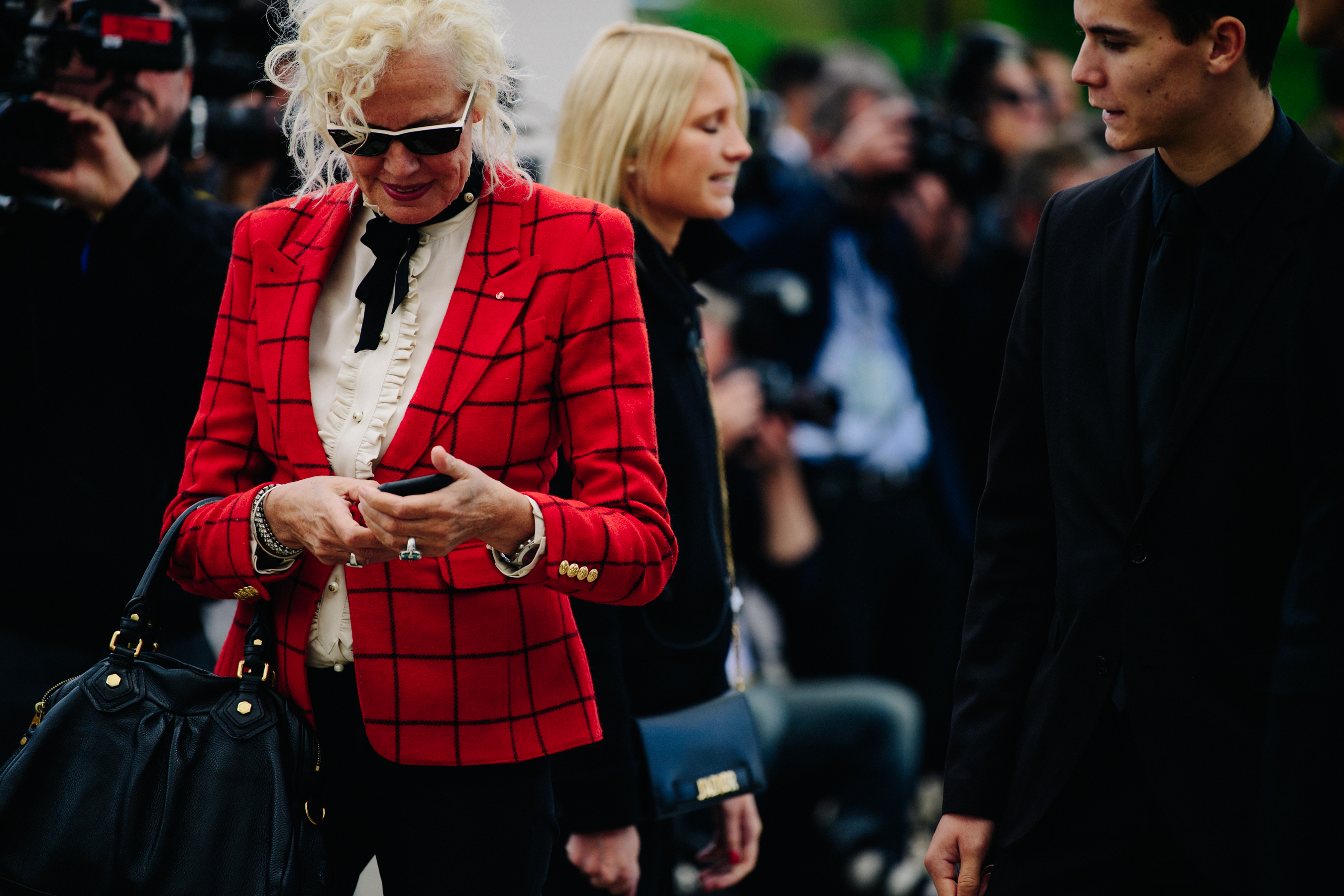 Woman carrying Christian Dior bag