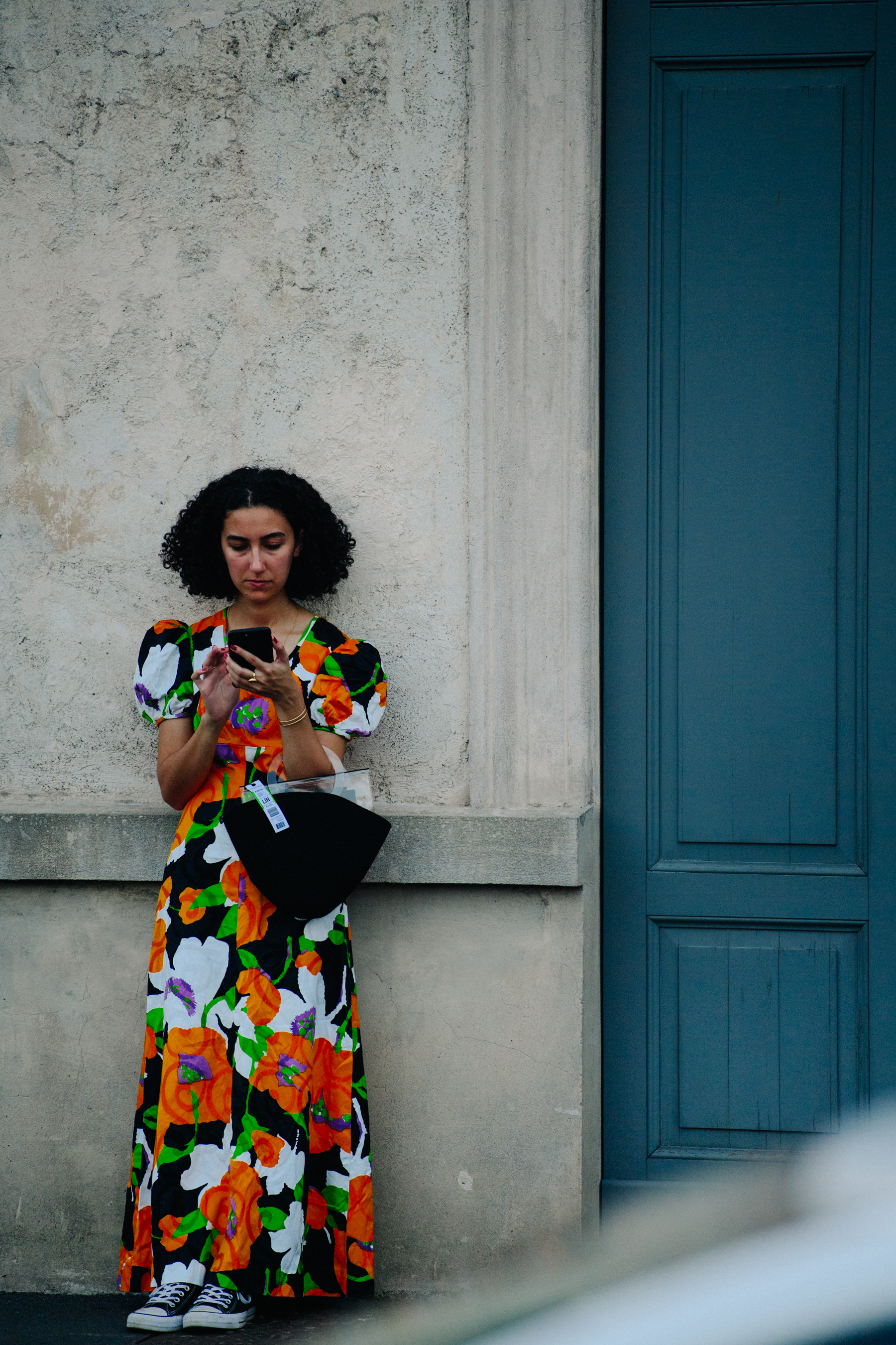 Woman wearing colourful floral dress