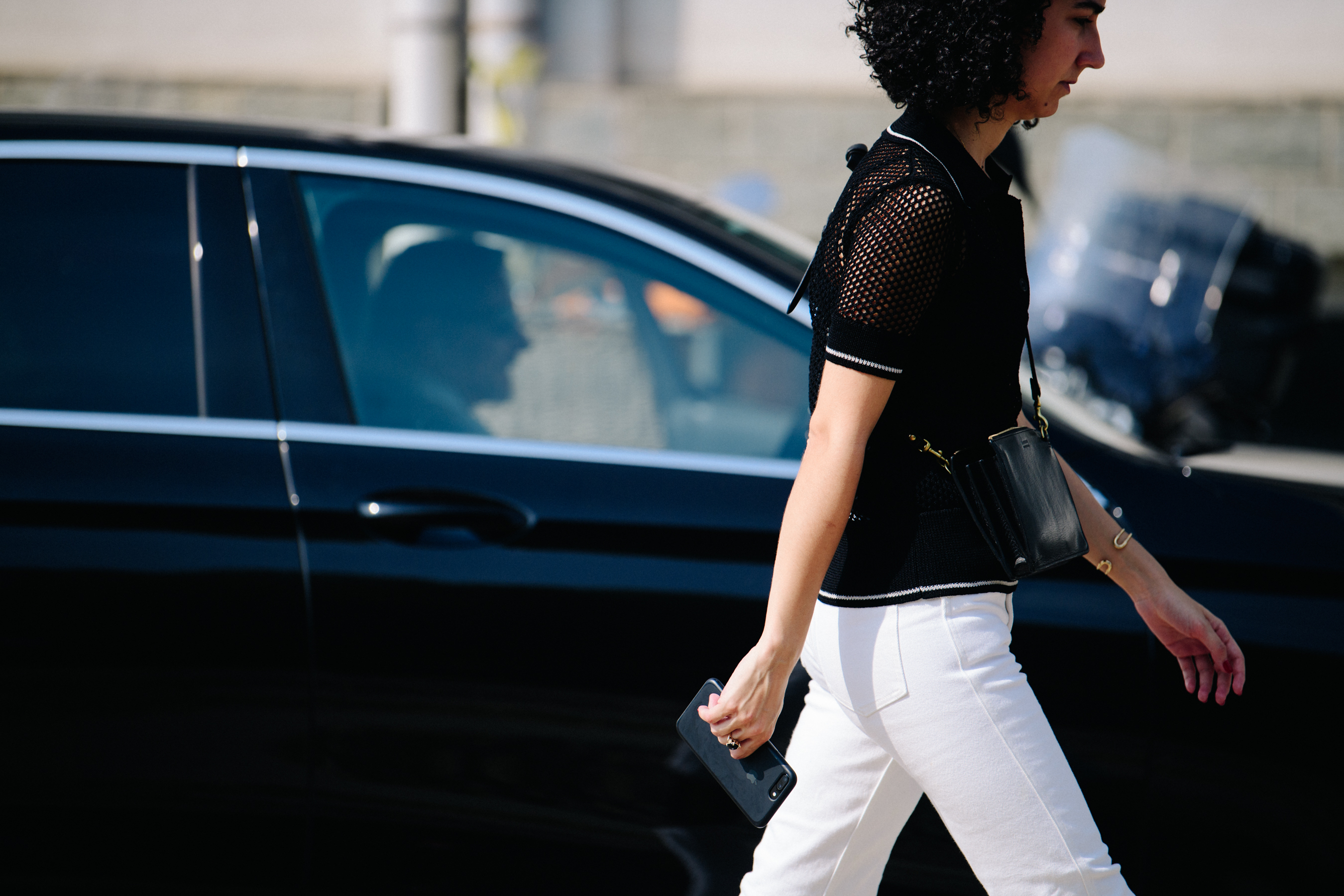 Woman wearing white and black