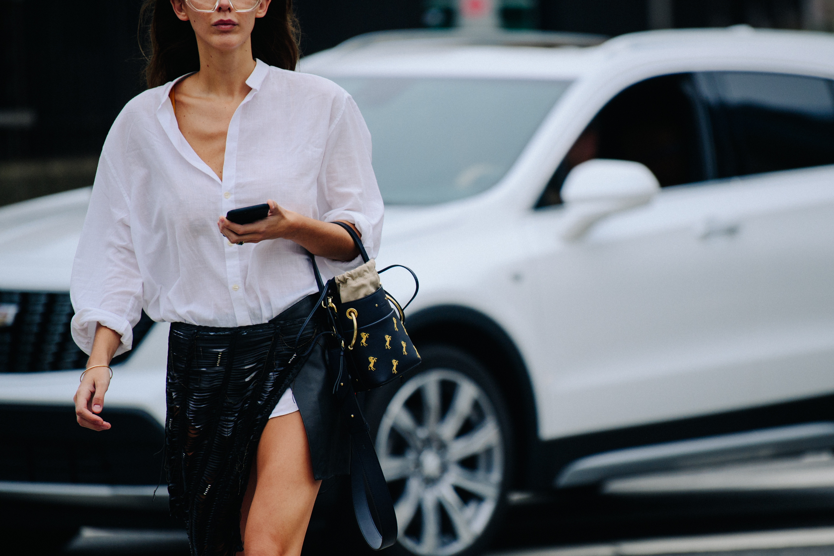 Woman wearing white linen shirt