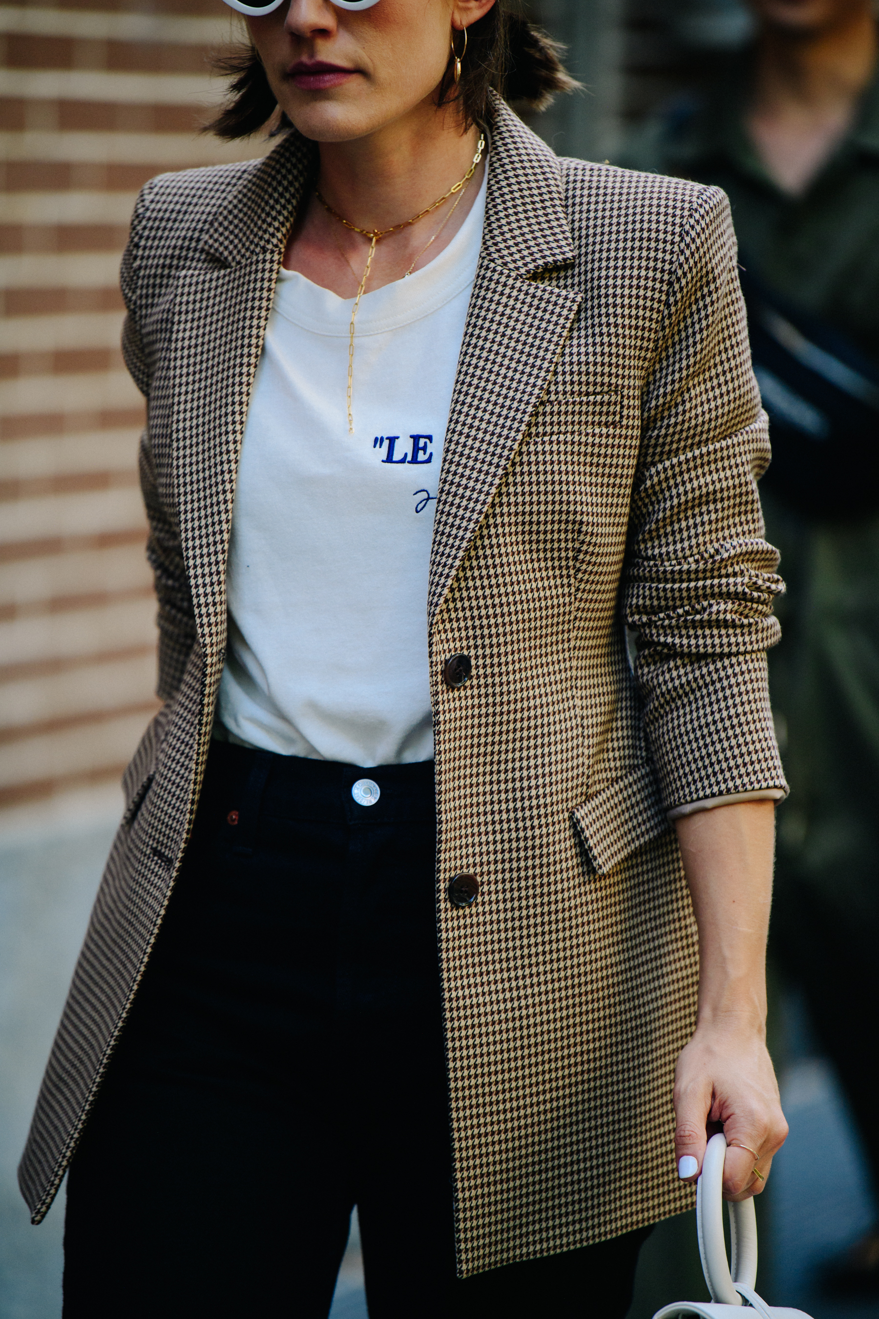 Woman wearing check jacket