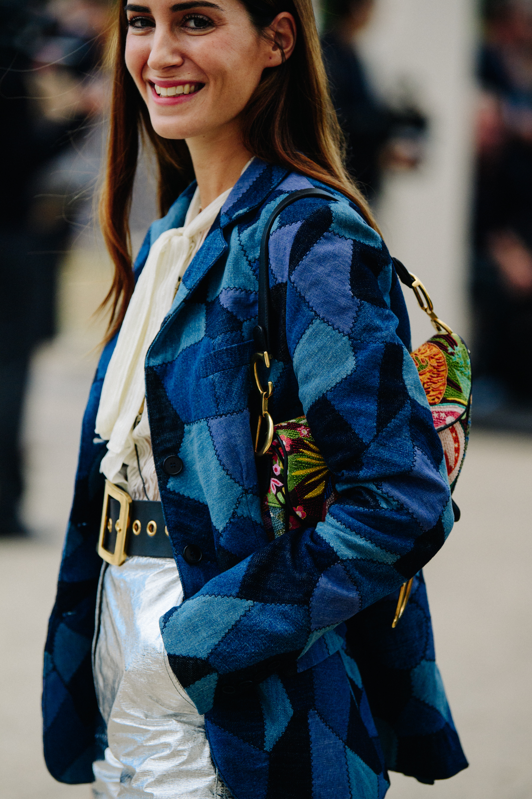 Woman carrying Christian Dior bag