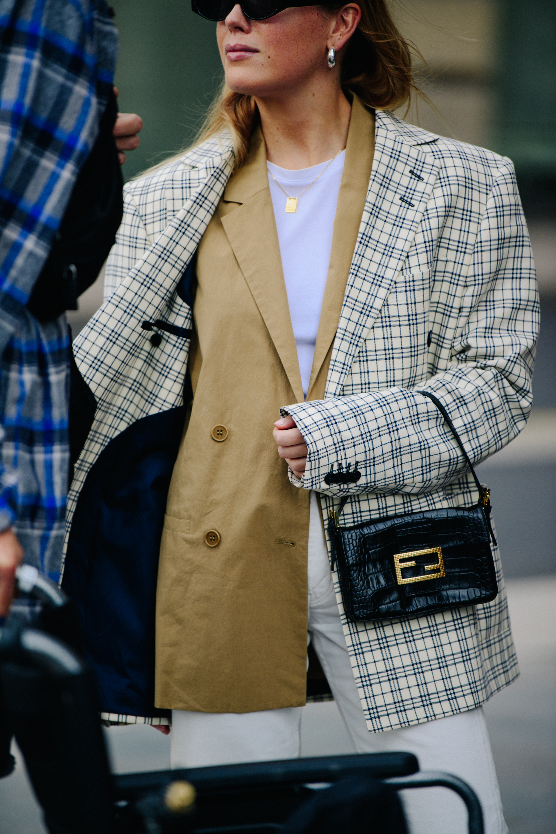 Woman wearing check jacket