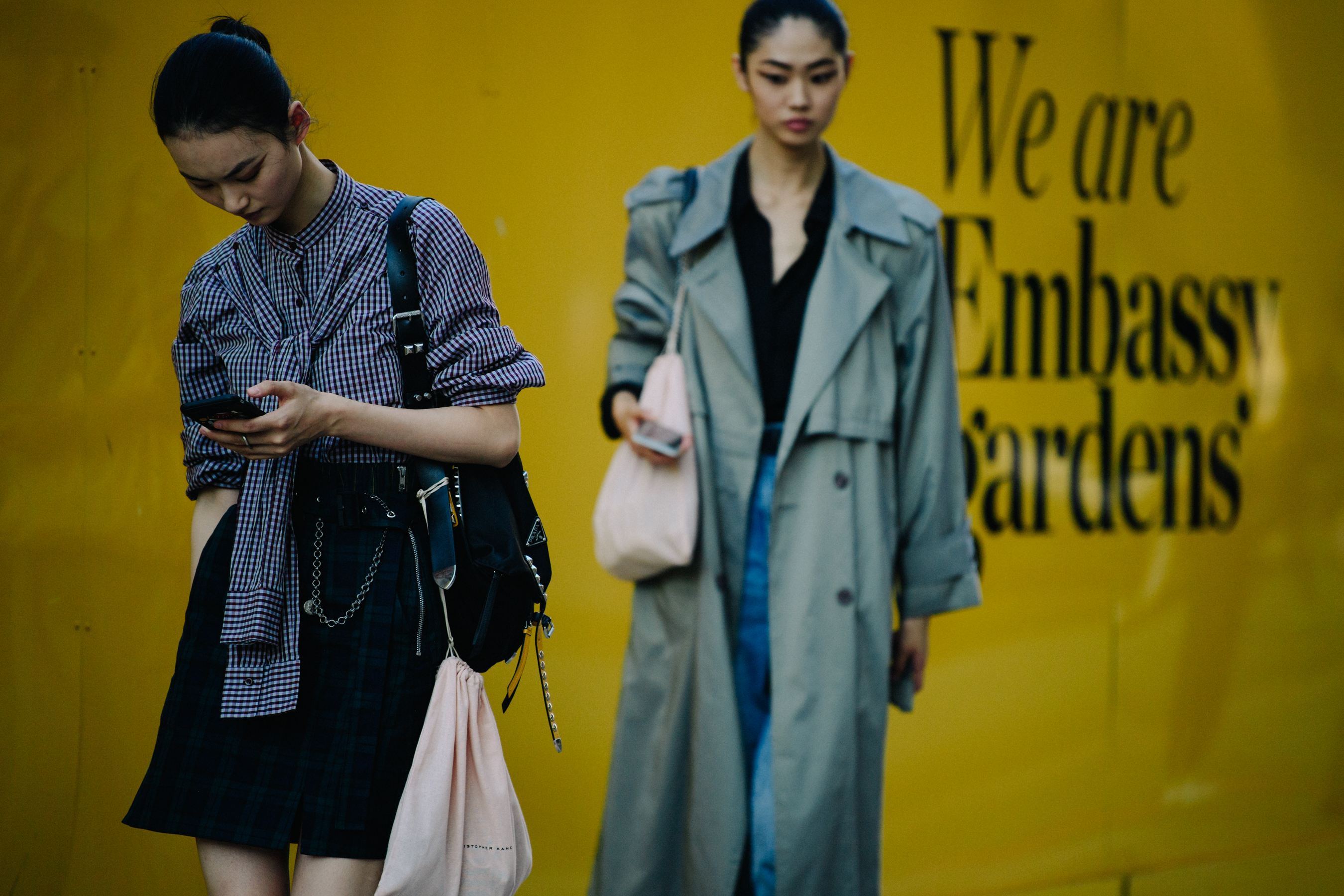 Two Asian models wearing smart clothing