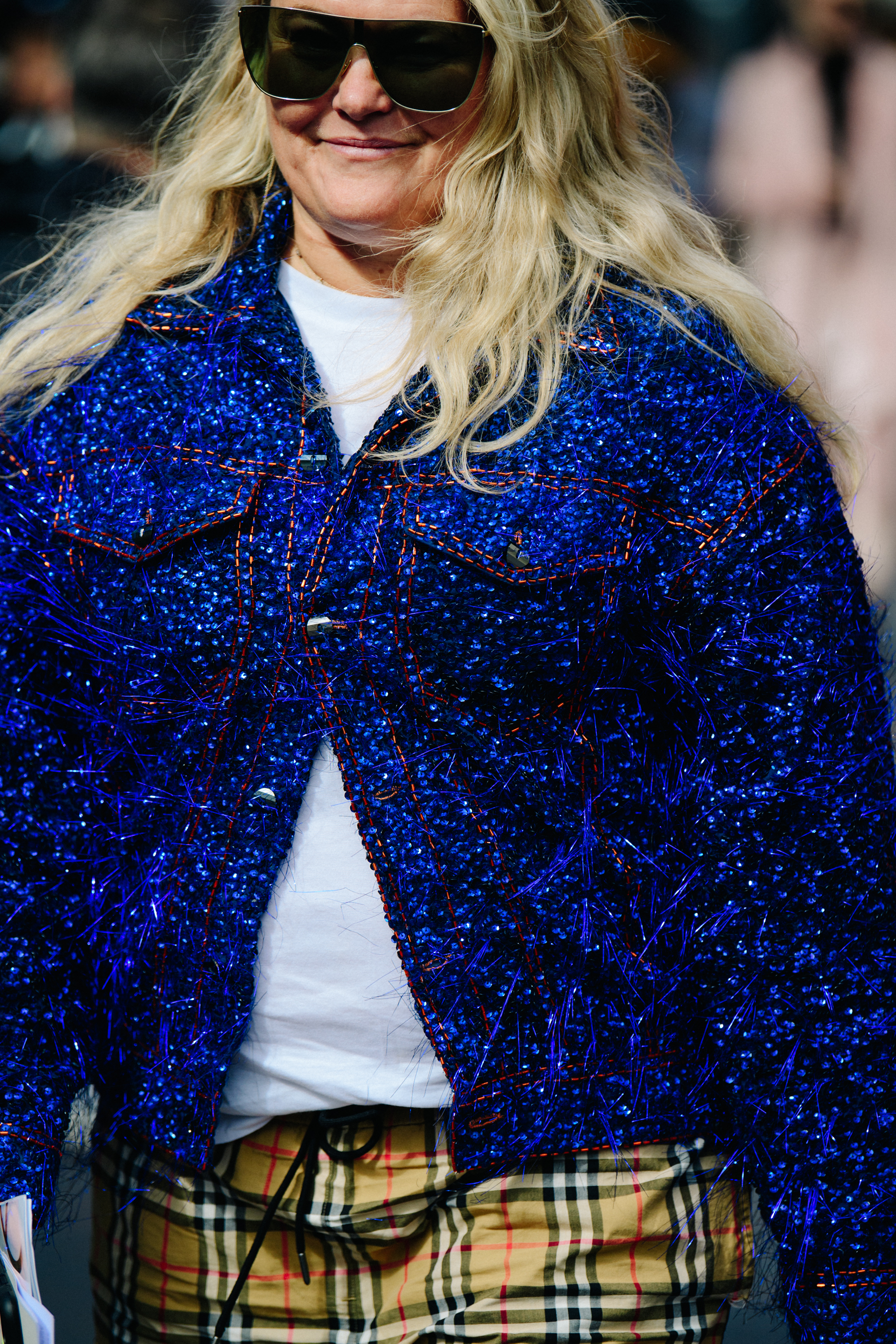 Woman wearing sequin jacket