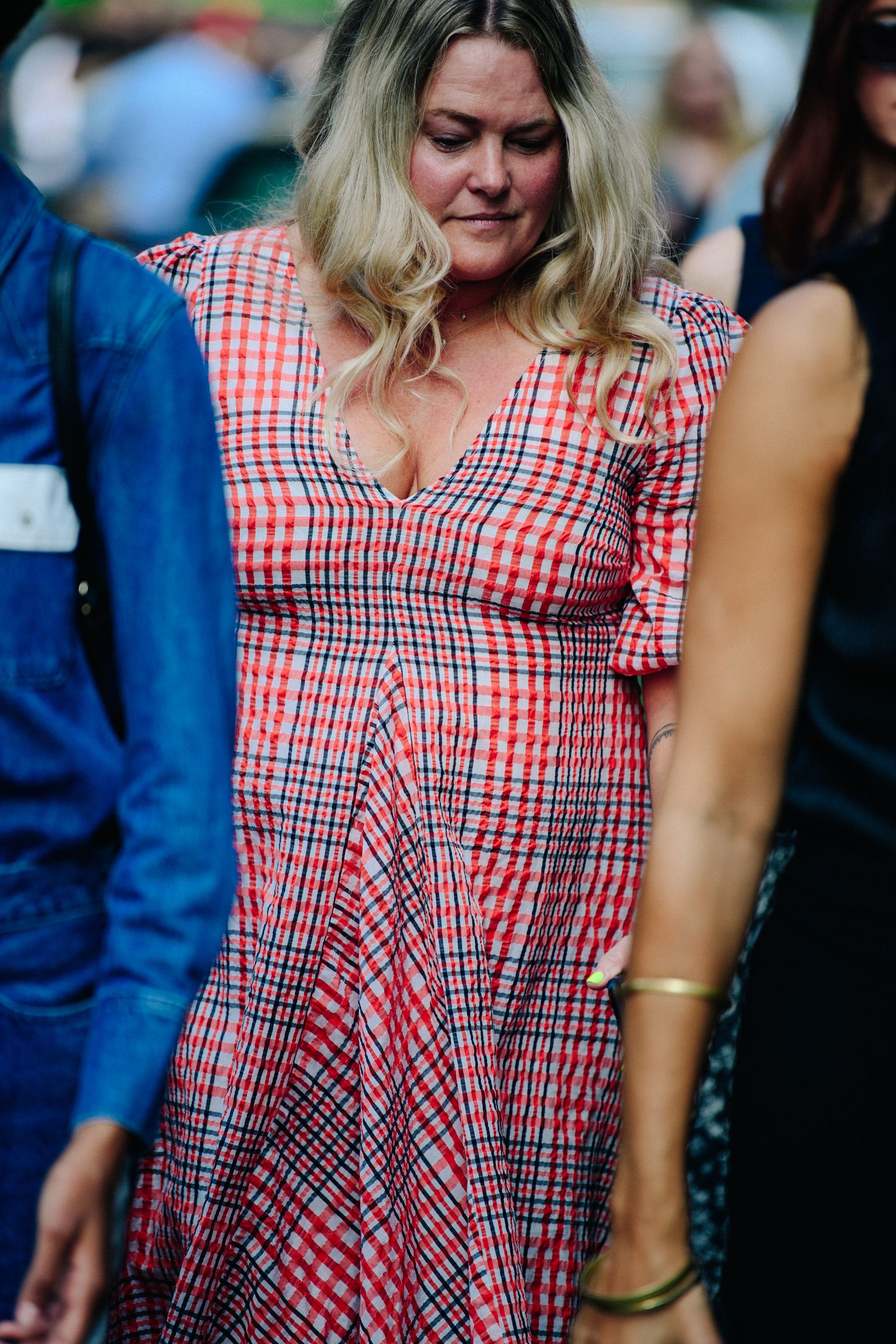 Woman wearing red check dress