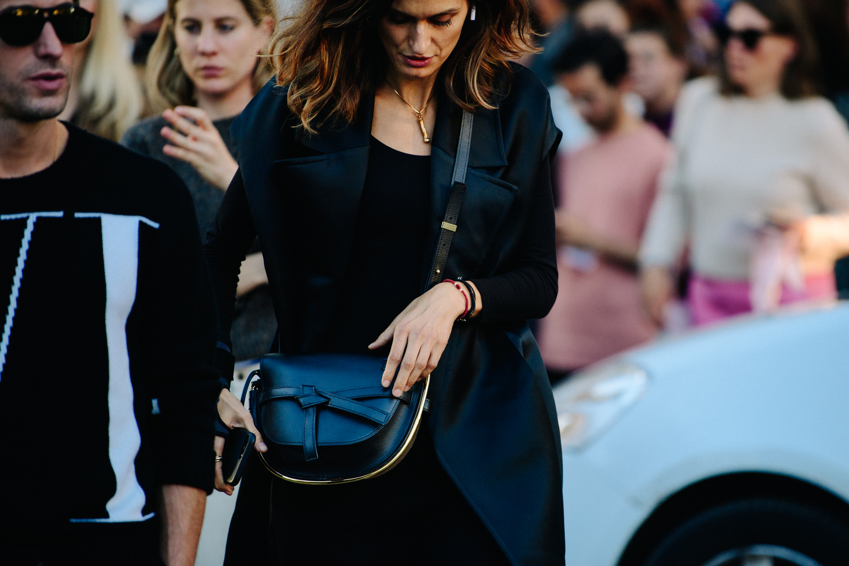 Woman wearing gold necklace
