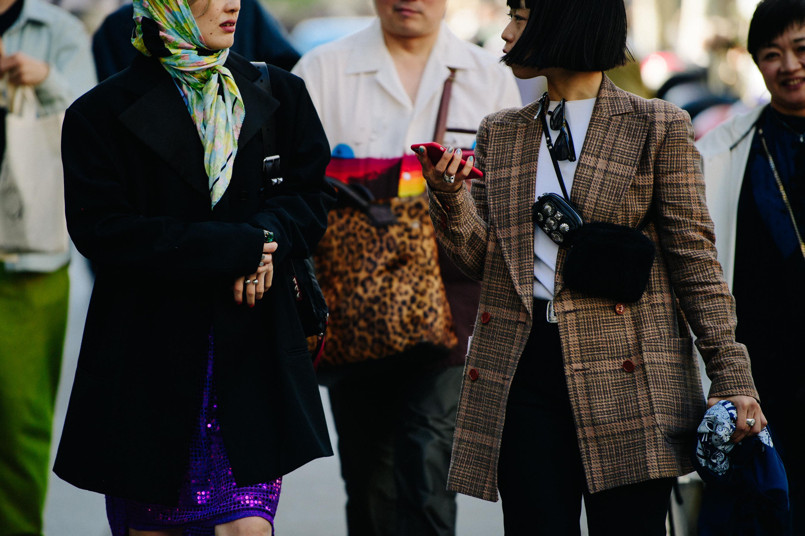 Two women wearing winter coats