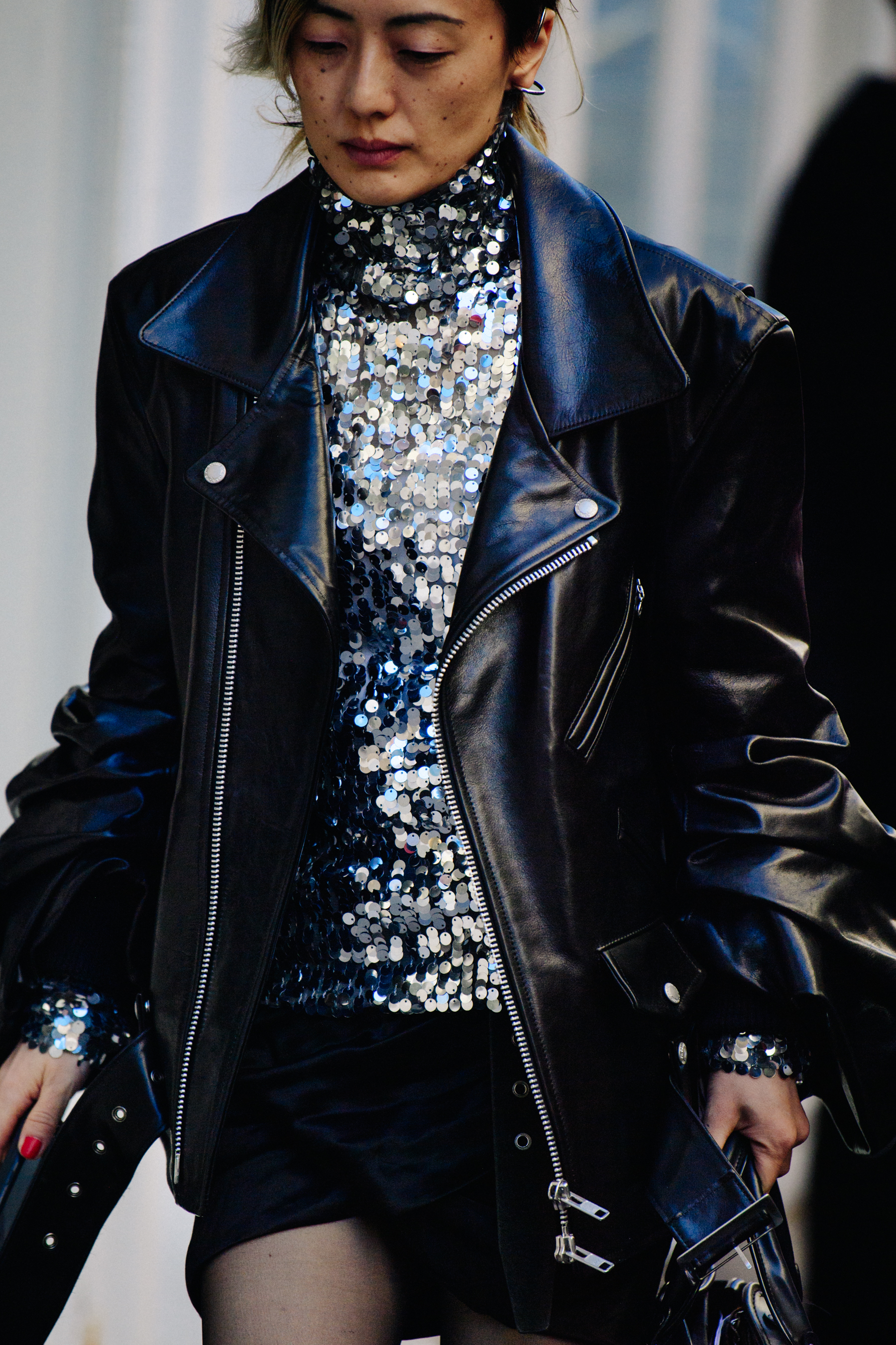 Woman wearing silver sequin top