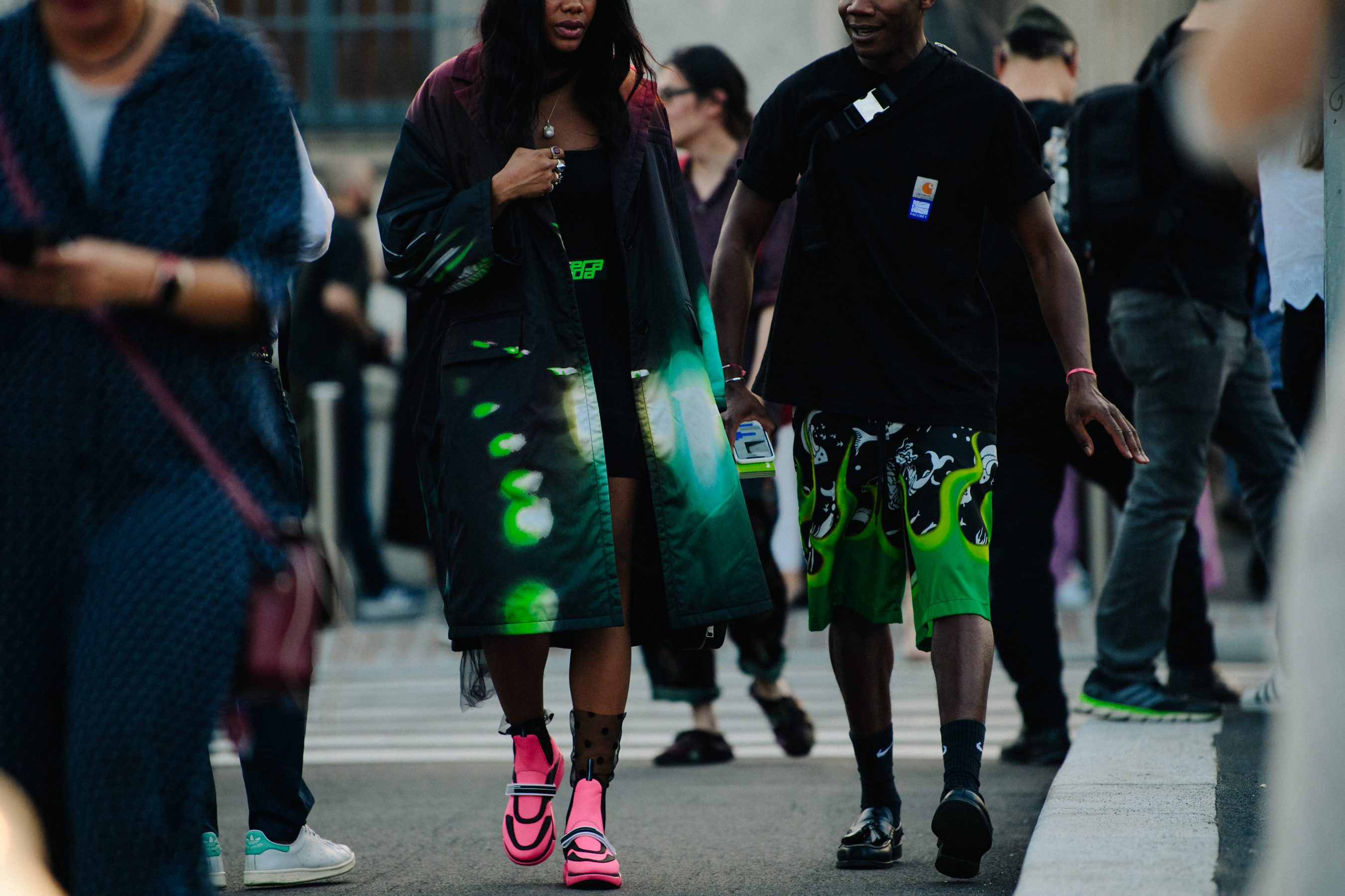Couple wearing Prada outfits