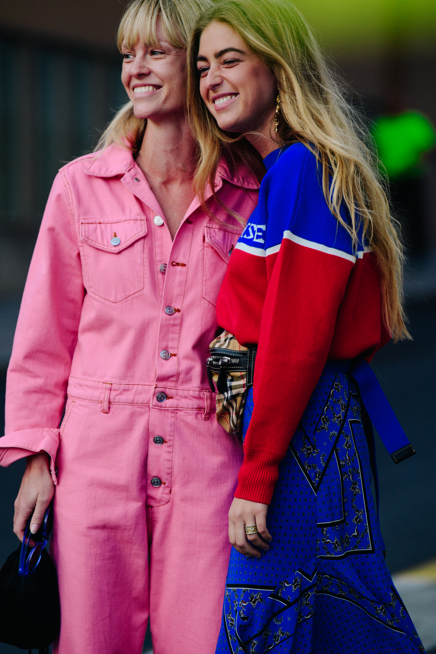 Two women wearing bright colours
