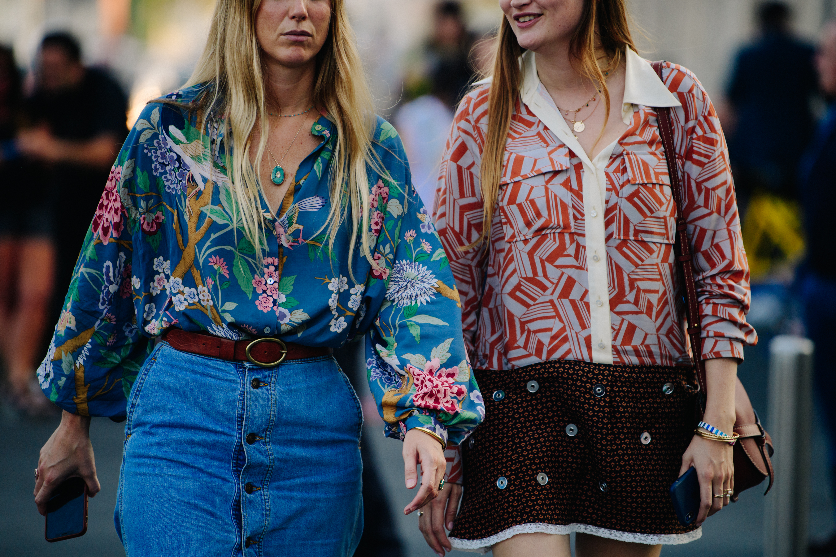 Two women wearing pattern shirts