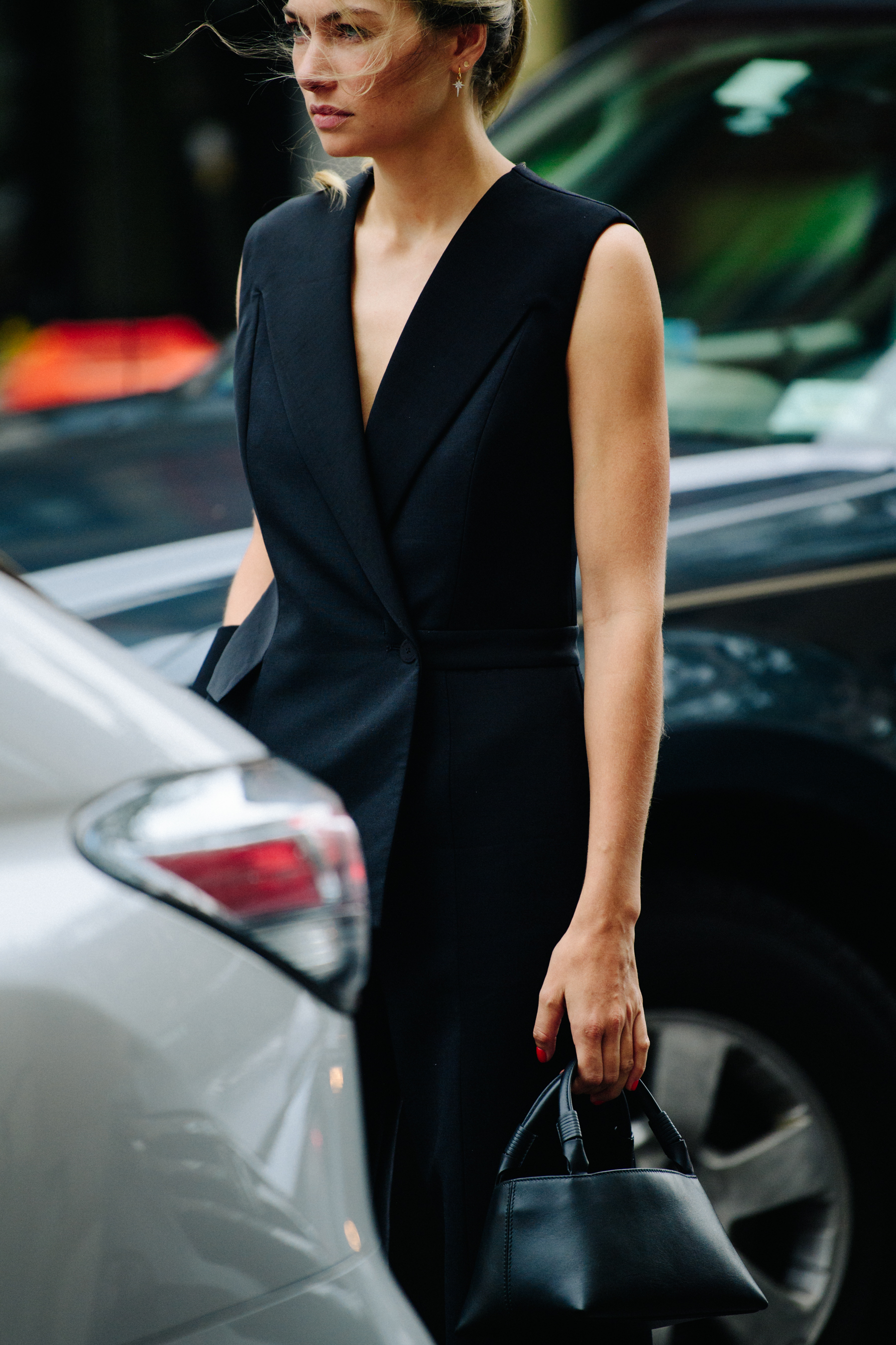 Woman wearing long black coat