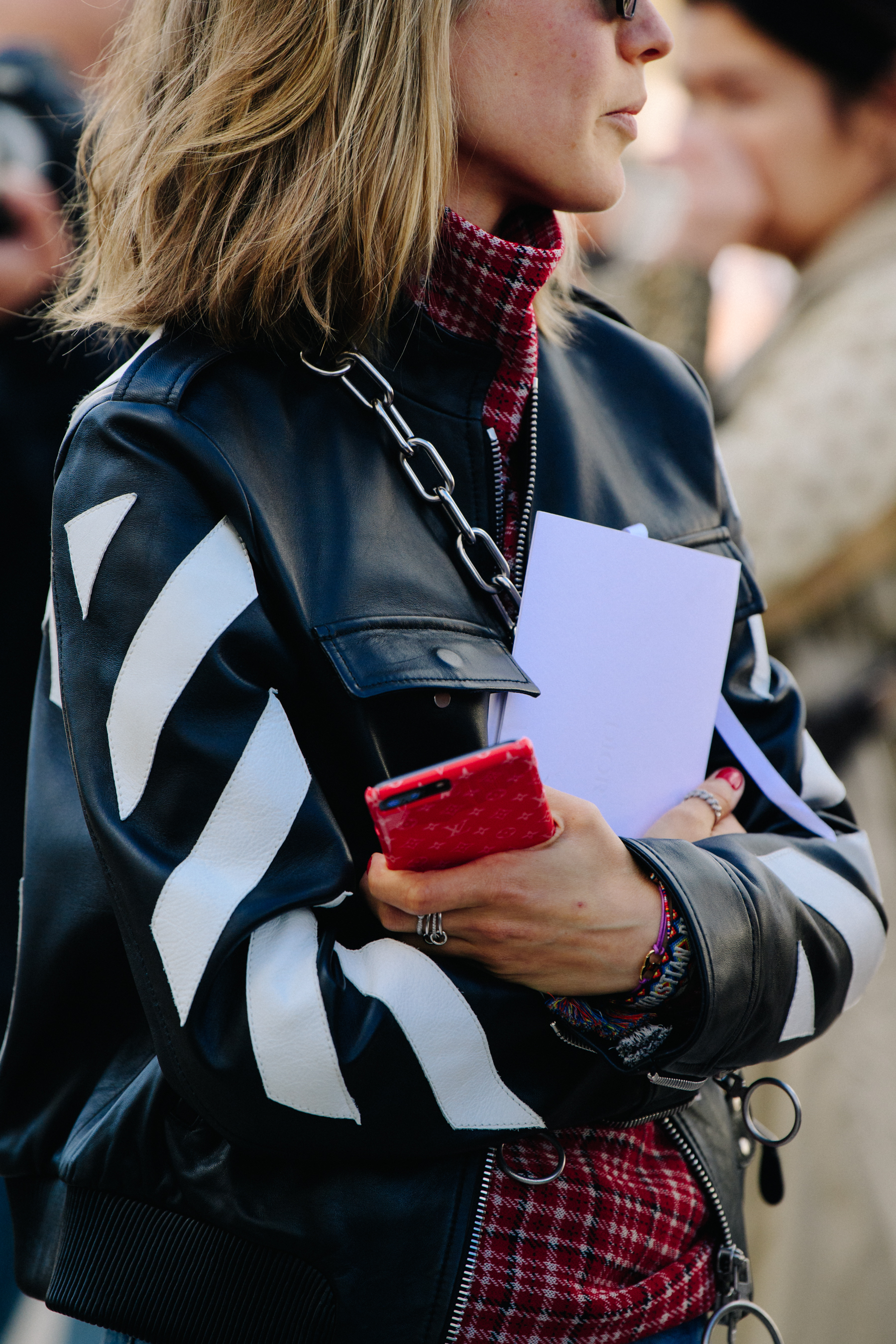 Woman wearing Off-White jacket
