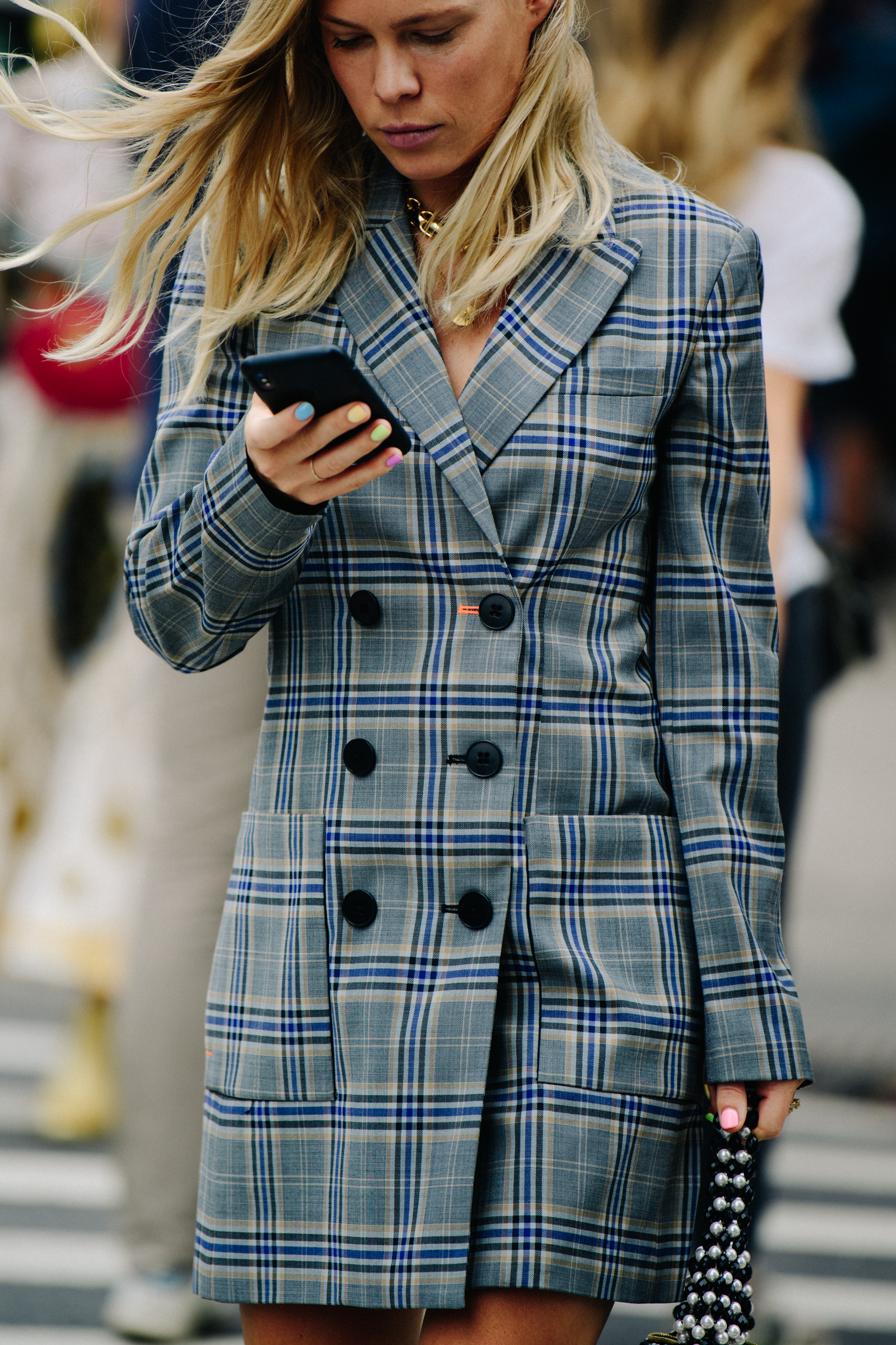 Woman wearing check coat