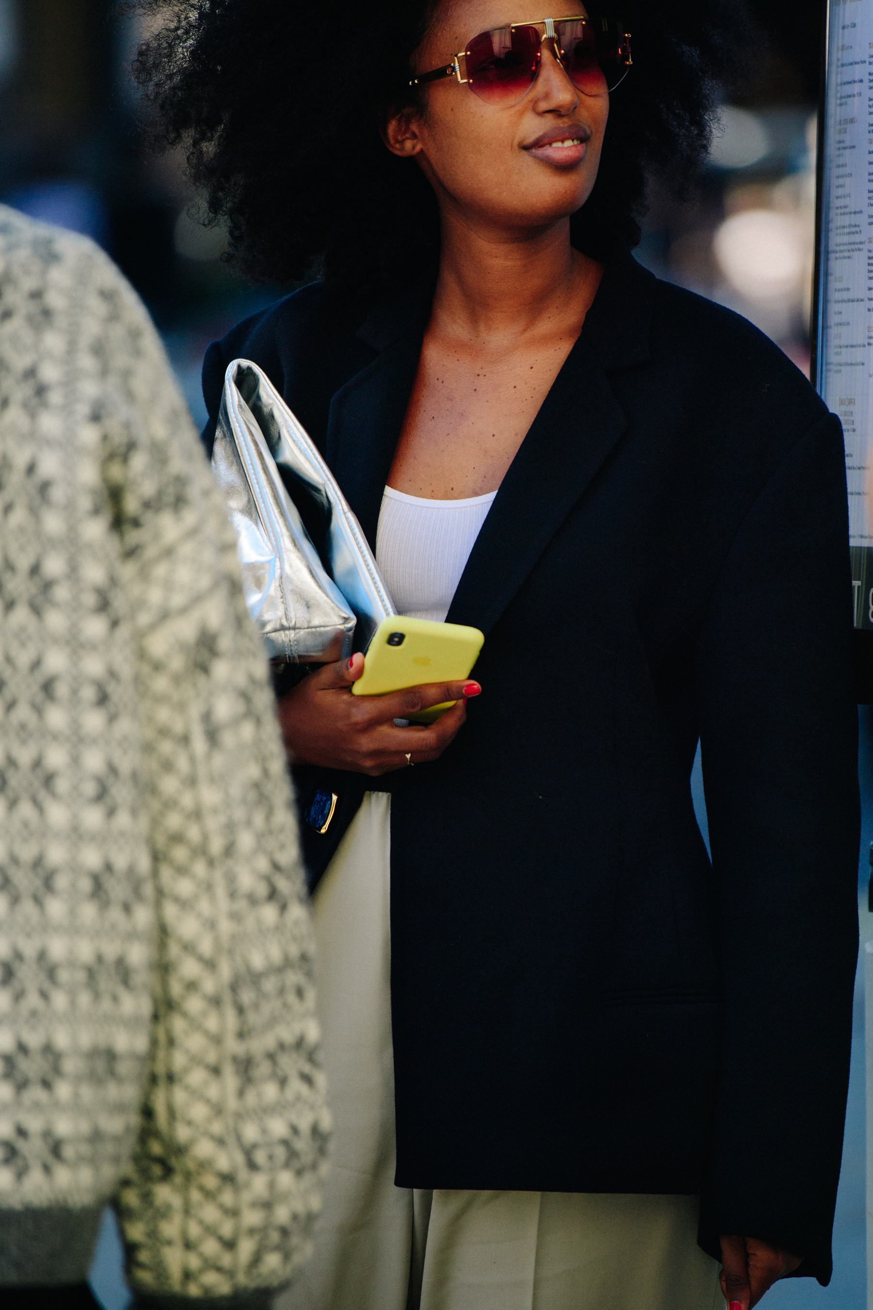 Woman wearing large sunglasses