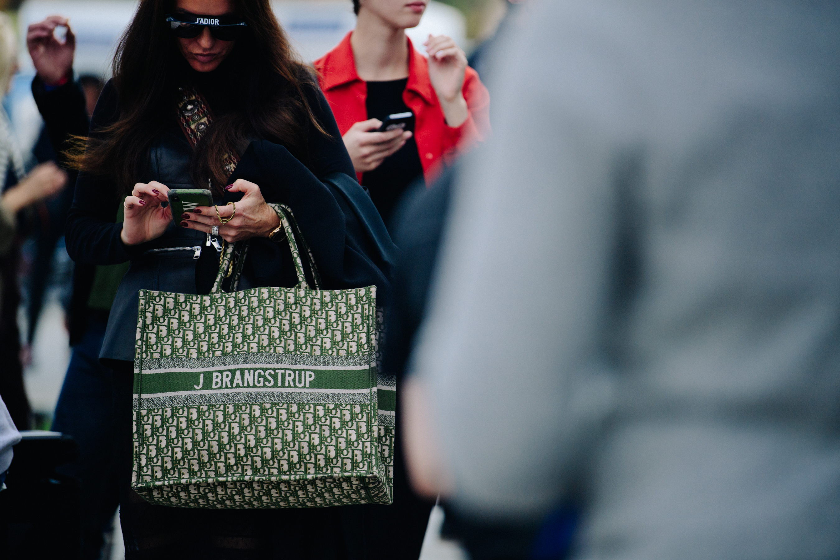 Woman carrying Christian Dior bag