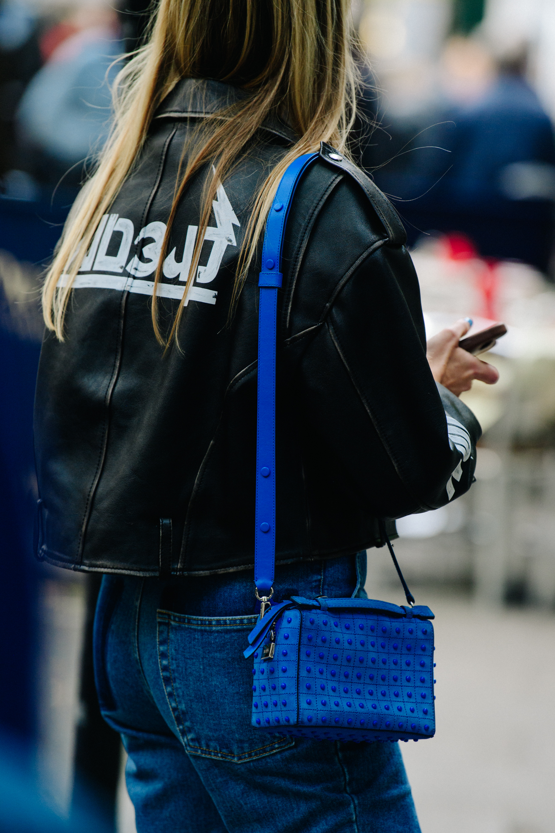 Woman wearing leather jacket