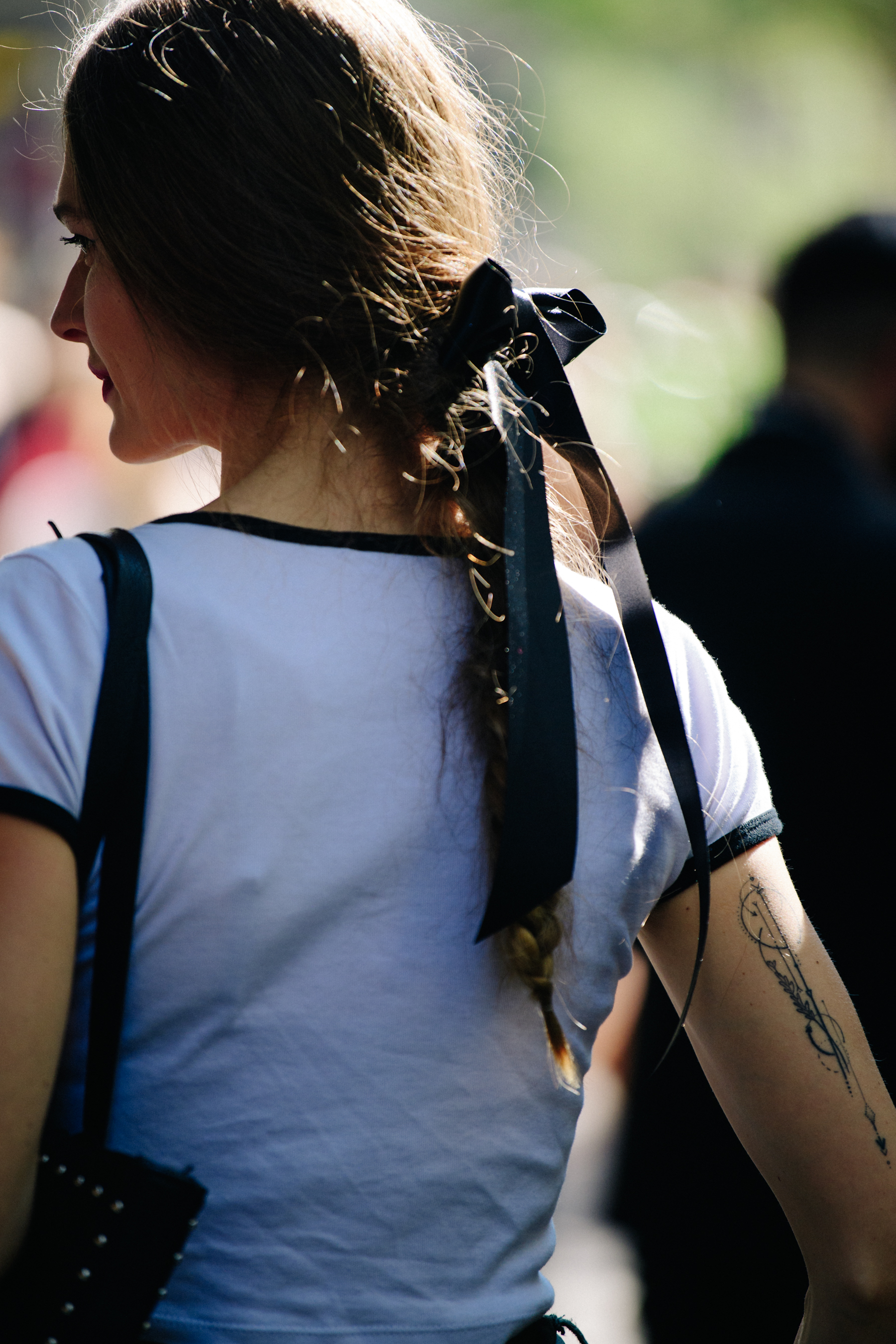 Model with arm tattoo
