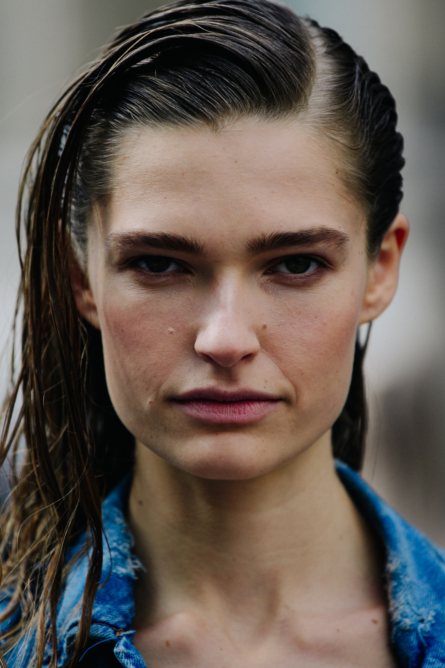Portrait of model with slicked hair
